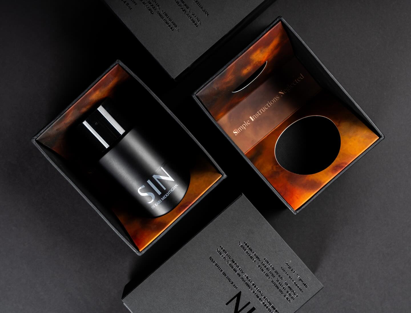 Dark. Bold. Unforgettable.
Custom packaging for SIN Perfume by @analogue.olfactory created by @karimmekhtigian , featuring dapper black boxes finished with impeccable details that embody pure luxury.