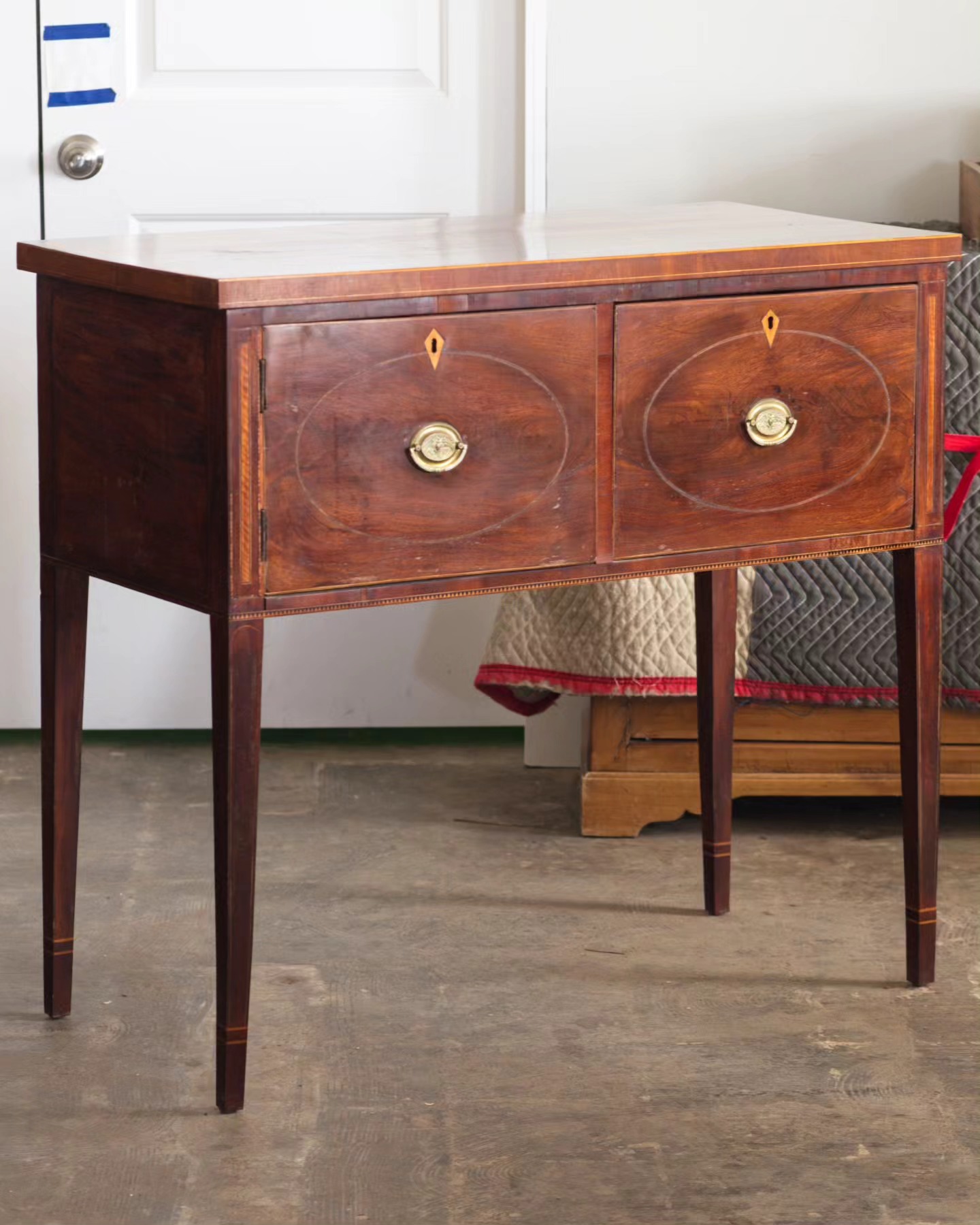A handsome small sideboard in for some repairs, mostly to replicate the missing sawtooth inlay.
#furniturerestoration #furniturerestorer #furniturerepair #mahogany #mahoganysideboard #sideboard #sawtoothinlay #restoredinbaltimore