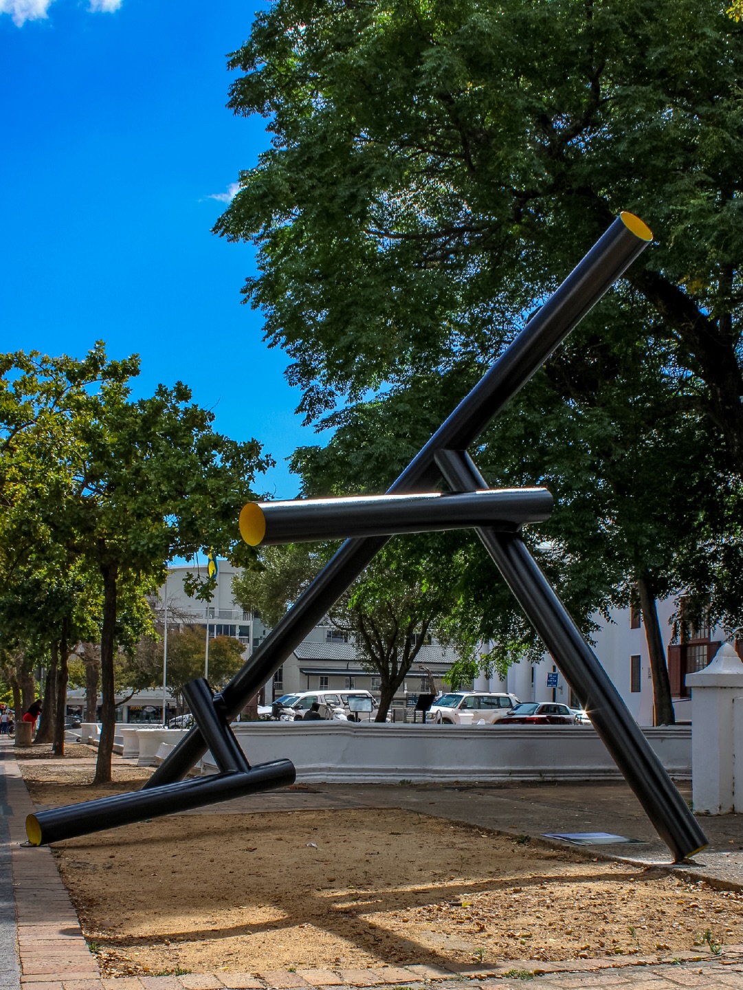 FALSEWORK ll by Kyle Moreland - @_kylemorland
2026 | Mild steel | Plein Street (Opposite ABSA)
Through the manipulation of materials, Morland’s sculptures address issues of subjectivity and social representation, expressing a fascination with spatial relations. Made with the precision of an engineer, his sculptures often appear as misplaced industrial parts. Construction supplies are his medium of choice, from mild steel sheeting to commercial paint. The scale of his sculptural work often compels viewers to measure themselves against the work. The sculptures speak of a playful engagement with contrasting notions of form, scale, weight and context. Sometimes Morland uses the offcuts of his sculptures to make new work, re-evaluating the use and form of commonly discarded materials.
Courtesy of Zeitz MOCAA Permanent Collection, @zeitzmocaa
Learn more → www.sost.co.za/artwork/falsework-ii
Dreamscapes - Form and space through curious eyes curated by Dr Mike Mavura @mikemavura_ | 26 February 2026 – 30 January 2027
Presented by the Stellenbosch Outdoor Sculpture Trust, @visitstellenbosch, and proud patron, Private Clients by Old Mutual.
#SOST #Dreamscapes #Stellenbosch #KyleMoreland #WealthCurated VisitStellenbosch