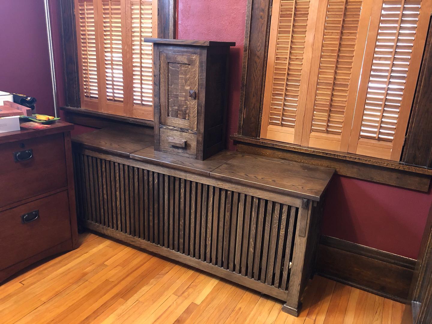 What a joy to make these three pieces for a favorite client. The cabinet above the radiator cover hides a charging station.