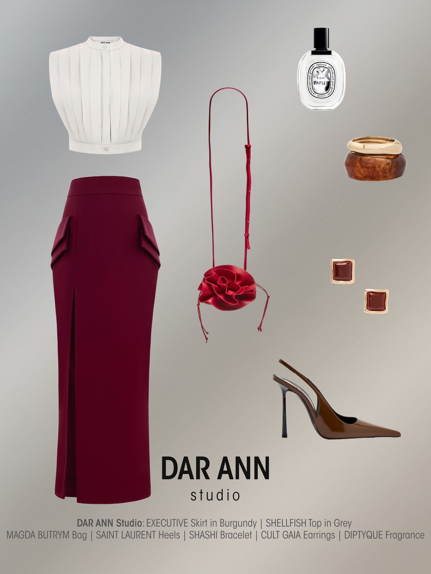Executive energy meets sculptural elegance ⚡️
.
Shop SHELLFISH Top in Grey and EXECUTIVE Skirt in Burgundy at www.darann.com
