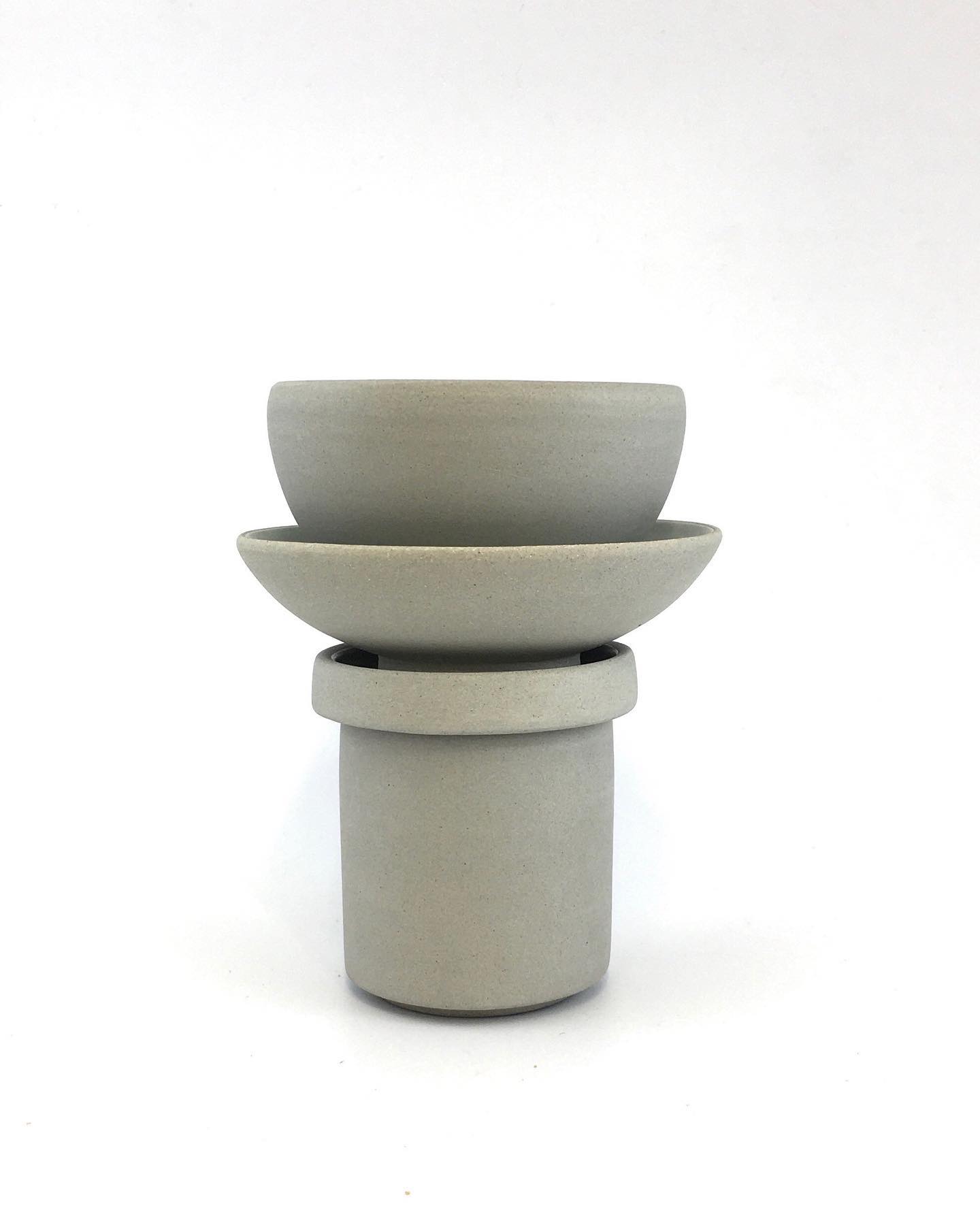 Inspired by concrete water towers, This 14.5cm ht Espresso Cup Tower may be petite but it’s ideal for those needing that mid-morning pick up. This piece includes a double espresso/juice shot tumbler with a saucer lid to rest your cup on or keep your drink hot. It also comes with two Sofia bowls. perfect for those with an undeniable sweet tooth as these bowls will hold plenty of biscuits or for the more health-conscious folks out there, a good 5 oz serving of yogurt and fruit. For more info on this piece and others like it check out my #newonlineshop. #watertower #contemporaryceramic #functionalsculpture #modernism #espressocup #brutalistarchitecture #towers #foodie #foodstyling #bowl #tableware #share #contemporaryart #designermakeruk #ceramicsofInstagram #uniquehomedecor
#handmade #kitchenstyling #brutalceramics #handmadeinwale