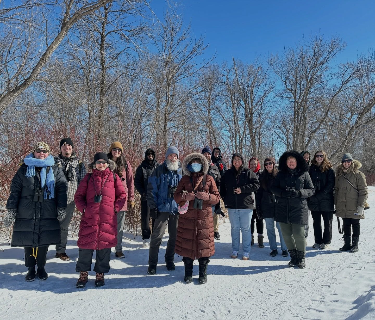 It was a great day to be birding and to be Indigenous! We could not have asked for a better first weekly walk of 2026! In total we spotted 12 species. Highlights included two mature migizii watching over us and a Red-bellied Woodpecker! Some of us even had a close encounter with a pair of Pileated Woodpeckers!
Chi-Miigwech! Maarsii! Thank you to everyone who joined us on this walk! It was an honour to walk with you. I hope you found some bird joy that will carry you through the rest of the week.
Our next bird walk is on March 17, 2026 at 11:30 am. Hope to see you there!
Slide 1: UMIBC birders posing for a group photo.
Slide 2: Two mature Bald Eagles perched on a branch.
Slide 3: UMIBC birders walking together.
Slide 4: Red-bellied Woodpecker caching a peanut.
Slide 5: Part 1 of the species spotted today.
Slide 6: Part 2 of the species spotted today.
Slide 7: Two mature Bald Eagles perched on a branch.
#indigenous #birdjoy #nature #community #representationmatters