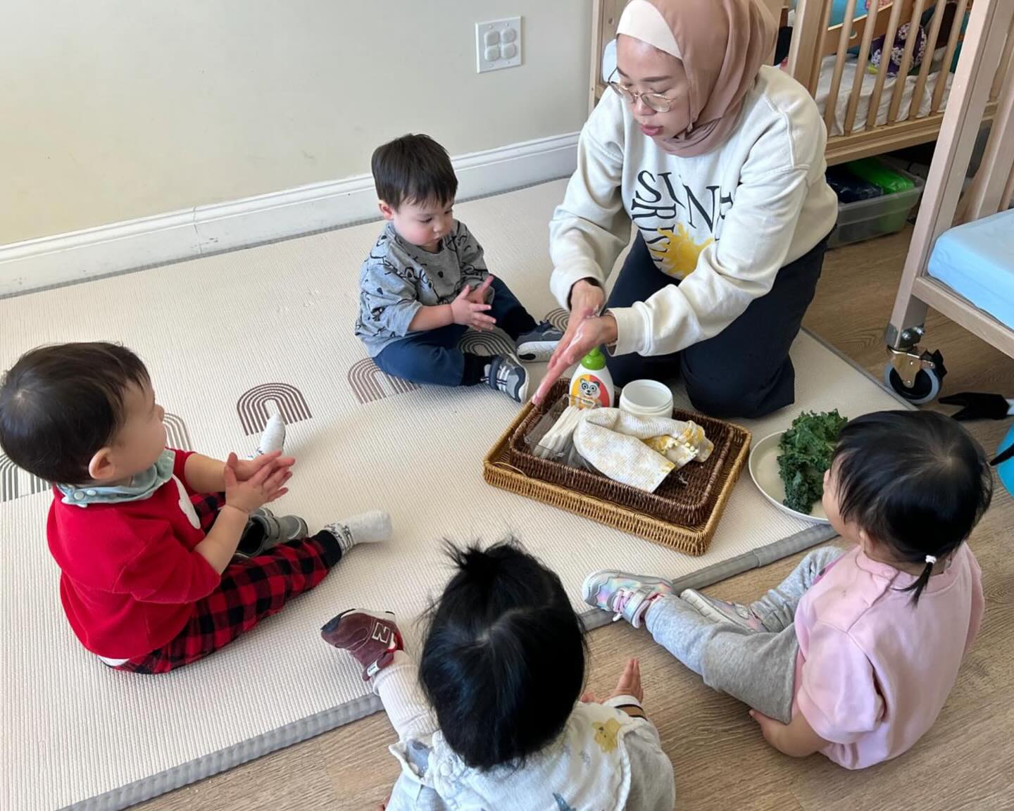 Our little explorers tasted kale this week! We examined the large, leafy vegetable together and even played a fun game of hide-and-seek with the giant leaves before trying a bite.
The roasted kale chips were a big hit. They were crispy, flavorful, and enjoyed by many of our curious tasters. We are always happy to see the children trying new healthy foods and gradually expanding their palates. 🥬
#sunrisemontessorinatick #toddler #foodtasting #kale #montessori