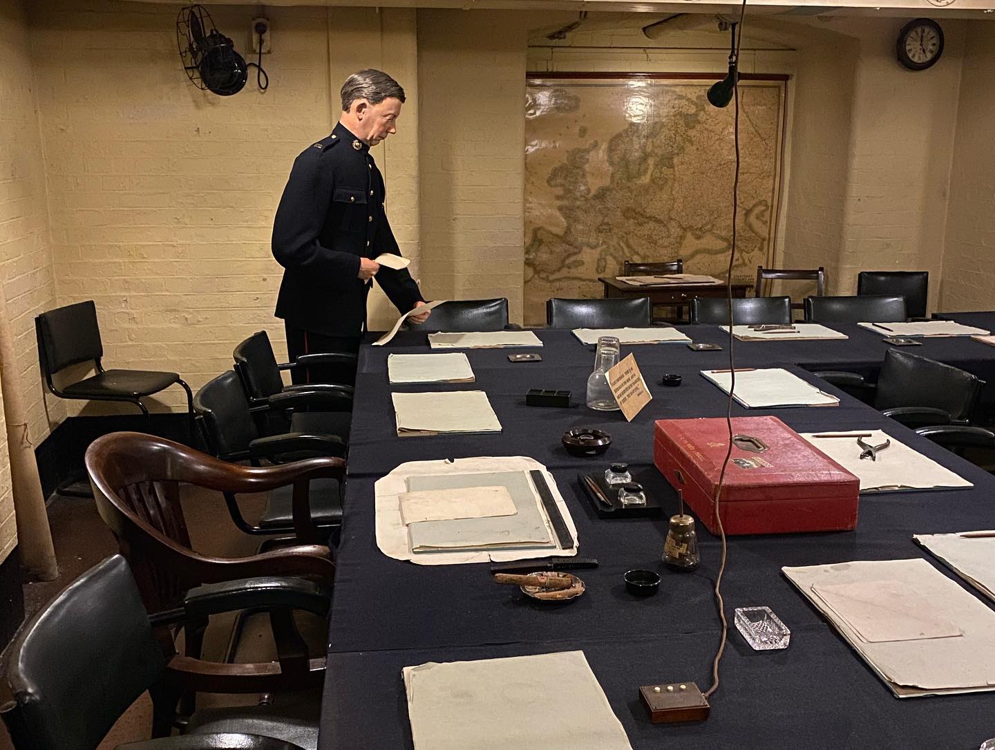 I was lucky enough to get to go behind the glass at the Churchill War Rooms last week. It’s a very special feeling to be in the rooms that Cabinet used to direct the country from during World War 2.
The claustrophobic, oppressive atmosphere of these small rooms, clogged with tobacco smoke is still tangible. The chair that Winston Churchill sat in during his cabinet meetings down here still bears the scar where his signet ring cut into the wood when he would thump the arm and demand he was listened to.
The Map Room is my favourite place down in the bunker. The men in this room plotted out every allied convoy in the world and tracked troop advances across the globe like a huge computer screen filtering the information from hundreds of other individuals fed into this room. Look at the line of bright Bakelite telephones and the bulbs next to them that lit up rather than the phones ring because otherwise the room would have been a constant cacophony of noise.
•
•
•
Hi I’m William Harry Mitchell, a Blue Badge Tourist Guide and Historical Interpreter. I lead tours around London and all over England. Want a tour? Have a look at my website (link in bio) for some ideas and get in touch through the contact form. @whmtours
#winstonchurchill #churchill #churchillwarrooms #behindtheglass #warhistory #bunker #ww2 #worldwar2 #london #blitz #cabinetwarrooms #history #maps #tours #tour #tourguide #touristguide #bluebadgeguide