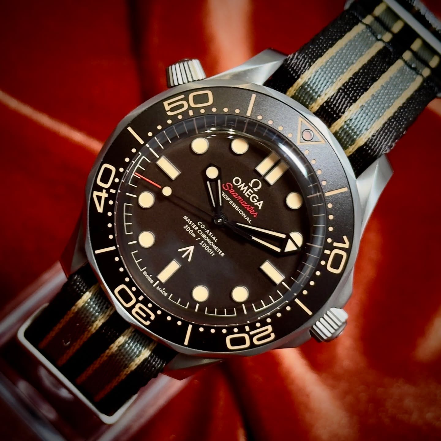 Omega Seamaster Diver 300M James Bond 007 “No Time to Die”
The only Diver 300M with no date, the dial is clean and features the broad arrow mark traditionally used my watches given to British special forces. This model will be discontinued when the next James Bond film is released.
Identical to 007's watch in No Time To Die this 42mm Seamaster, in strong yet lightweight Grade 2 Titanium, sports a brown tropical aluminum bezel ring and dial.
Slightly slimmer than the standard Diver 300M models thanks to the doming of the sapphire-crystal glass, it is presented on a striped NATO strap in brown, grey and beige with 007 engraved on a titanium loop.
The 007-edition Diver is powered by OMEGA's Co-Axial Master Chronometer 8806, which has achieved the industry’s highest standards of precision, chronometric performance - and of course - magnetic resistance.
Ref. 210.92.42.20.01.001
DM for more info