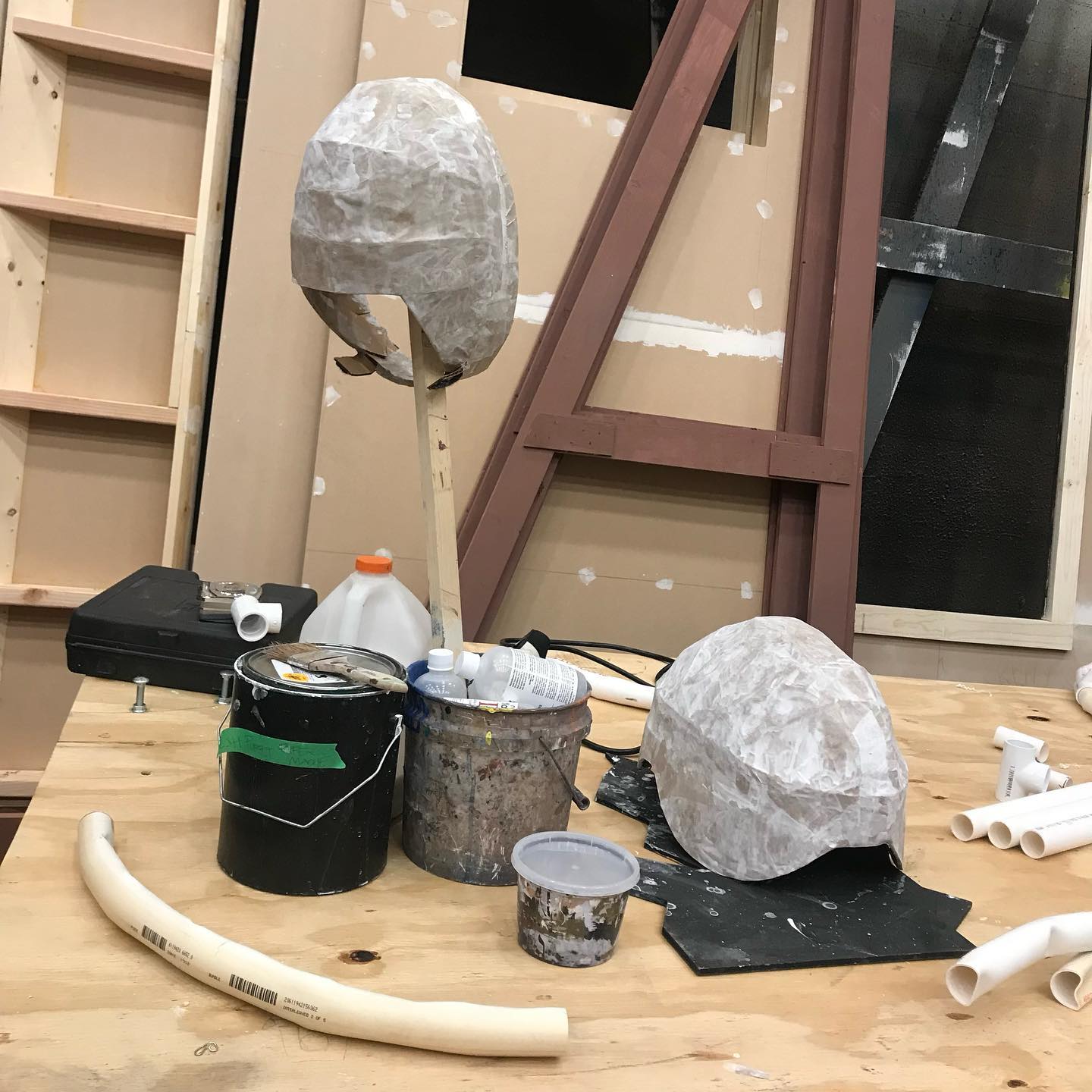 March 11th, 2020- I snapped a photo of my progress on the Little Shop of Horrors puppet on my way out of the shop. I was leaving for spring break, and the main topic of conversation that day at work was the fact that WHO had just declared a global pandemic. I worried for the first time if that new covid thing might affect the theatre field in a major way- two weeks later, I wondered if I’d ever get to make theatre again.
March 11th, 2021- I took a photo of the license plate I painted that day for our upcoming production of bobrauschenbergamerica. It was a small detail buried in the clutter, but I was grateful to be back in the shop working on a show after almost a whole year away. We couldn’t have a live audience for bob, but I was making theatre I was proud of. I was so happy to be back, even the little things like license plates were worth documenting.
March 11th, 2022- Two years, a lot of heartache, and even more of artistic growth later, I brought that finished puppet from Little Shop and my Scenic Design of bob to present at SETC. It was my first in person conference since the pandemic began, and I was wildly nervous to be back out there showing my work outside of the UNLV bubble. The other designers and artisans at the show were INCREDIBLE, and I was honored to merely have my work shown in the same display area. To bring home an honorable mention for the Prop Design category, and FIRST PLACE for the Graduate Scenic Design category was beyond my wildest hopes for the convention. I am so grateful to give these two pandemic shows the closure they deserved, and humbled to have my work recognized in this way.
Time to make more art!