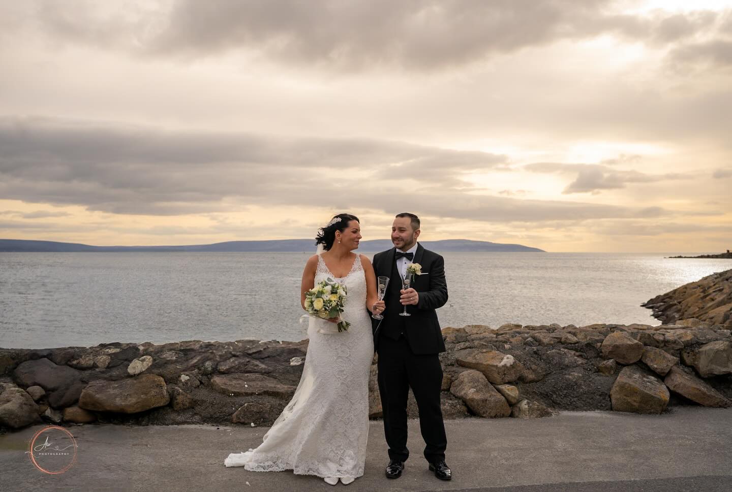 How is this a year ago already 🫢 Such a lovely day with fab vibes and despite the freezing temperatures these two braved the elements in Galway City! Congratulations on your first anniversary #salthillwedding #salthillgalway