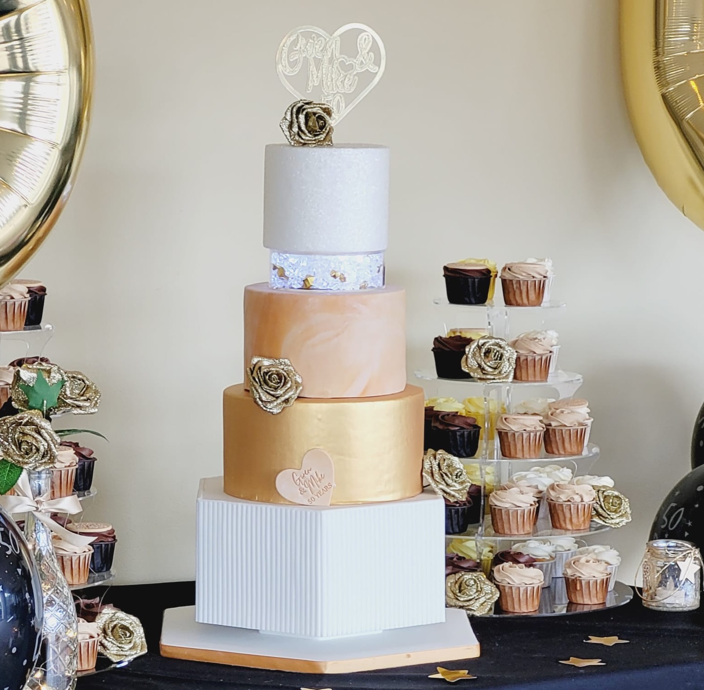 ✨ 50 Years. One Love. One Celebration. ✨
A golden milestone deserves something truly unforgettable.
This 50th anniversary cake display was designed to be the centrepiece of the celebration - featuring elegant champagne tones, luxurious gold tiers, display roses, and a glowing middle tier to add a little magic to the moment.
Surrounded by matching cupcakes and gold details, this setup was all about celebrating half a century of love, memories, and commitment. 💛
Imagine cutting into this after 50 incredible years together…
Congratulations to a beautiful couple celebrating their Golden Anniversary 🥂
#GoldenAnniversary #AnniversaryCake #northwalescakes #CelebrationCake