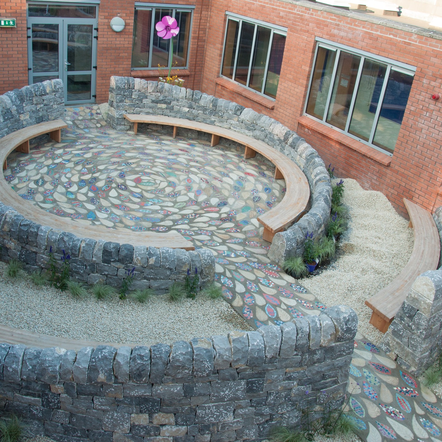 I just rediscovered an old video of a small dry-stone sanctuary I created in the heart of a school in Dublin some years ago. There was something almost theatrical about the journey — moving through dim, echoing corridors before the space gently revealed itself as an open-air classroom of drystone and art. I can still feel the rhythm of those long days, barrowing countless loads of stone through winding hallways, each step shaping a quiet place for learning, reflection, and imagination.
#drystonewalling #stonework #outdoorclassroom #landart #placemaking #schoolgardens #sustainabledesign #naturalmaterials #craftsmanship #irishdesign #dublinireland #gardeninspiration #slowdesign #builtbyhand #environmentaleducation