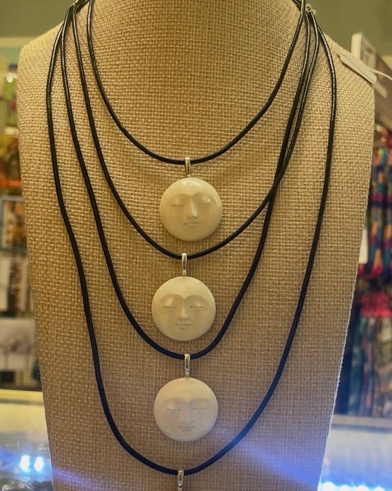 Sometimes something just beautiful comes into the store, and these lovely serene Moon face pendants are one of them 🌺 Each one is hand carved from water buffalo horn, a non-endangered species in Bali. We have various length cords and a silk pouch to put them in.. magical!! A beautiful gift! We all could use a reminder of serenity these days.. (think ahead for Mother’s Day) and we ship.! # Moon #moonface # fullmoon #serenity #moongoddess #bali #carvedmoon #peaceful #middleburyvermont #middleburycollege #mothersday