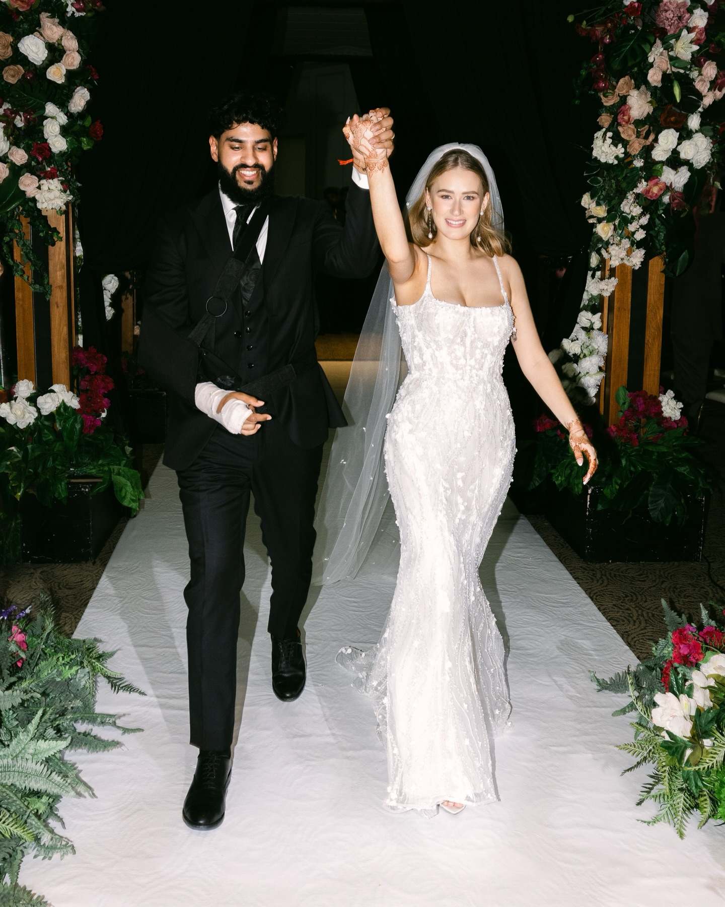 Introducing Mr. & Mrs. Heer. ✨
The groom broke his arm the week of the wedding. He danced anyway. Through draped floral arches, into a room of emerald and candlelight and the most beautiful dusky blooms — they made it unforgettable. Cast and all. 🖤
Design, Decor & Florals @universaldecor
Venue @thegrandempire_
Planner @affineweddings
Beautifully captured by @kamiliashinphotography
Cake @cakesbyyazb
Mua @katiemaxwellmakeup
Our stunning couple @shelbyheer @darshheer