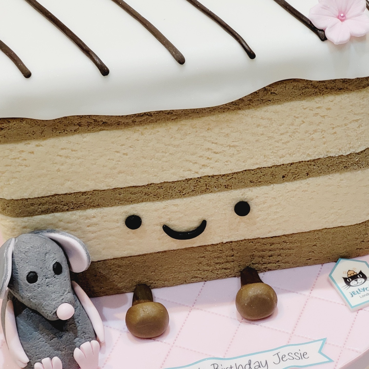 Sweet celebrations for a special milestone 🎂✨
This adorable celebration Milie Mille-Feuille & Lachlan Rat @jellycat Cake was made to mark an 18th birthday in the cutest way possible! A soft, layered design with a smiling face, chocolate drizzle, and a their childhood tiny friend sitting by its side 💗
Finished with delicate details and a pastel presentation, it’s the perfect mix of fun, charm, and elegance for such a memorable day.
Happy 18th Birthday Jessie! 💕
#CelebrationCake #18thBirthday #BirthdayCake #CuteCake #CustomCake