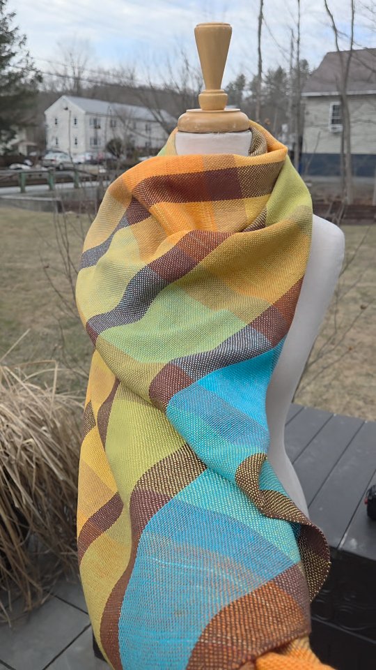 Wide scarf/wrap that actually started it's life out on the loom as a run of towels. Cutting the warp and resleying creates diversity and the ability to obtain different types of fabric from the same warp.
https://sunrisehandwovens.etsy.com/listing/1322584197
#sunriselodgefiberstudio #weaversofinstagram #weaving #handmade #handwoven