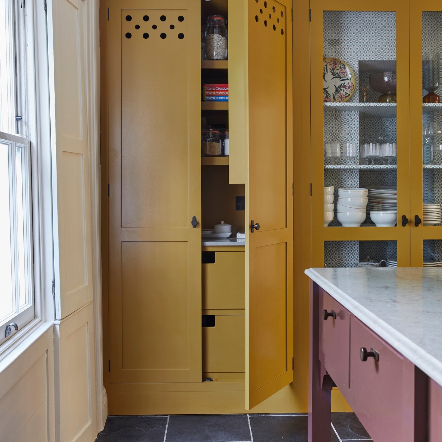 J Harris Kitchens is now famous! Only joking, but J Harris Kitchens has now been featured in @period_living and @homesandgardensofficial! So Let’s take a look at the kitchen that’s put us on the map. From cupboard combinations, incorporating original features, settling on a perfect layout and choosing colours. This is a basement Georgian kitchen with black limestone flooring, yellow shaker cabinets and open and freestanding kitchen island. The worktop was a cherry marble with a beautiful bevel edge. Flick through the photos for a full tour of this kitchen... #jharriskitchens