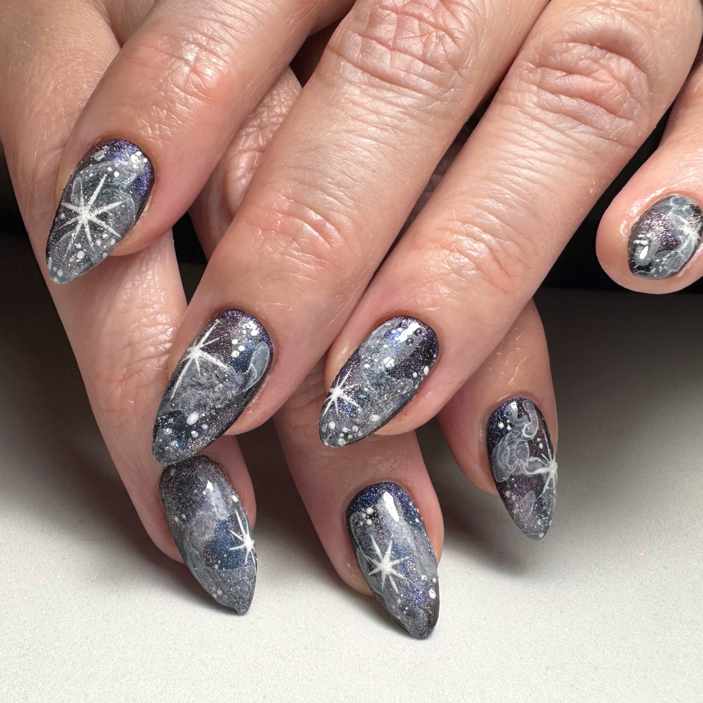 Galaxy inspired art on natural nails