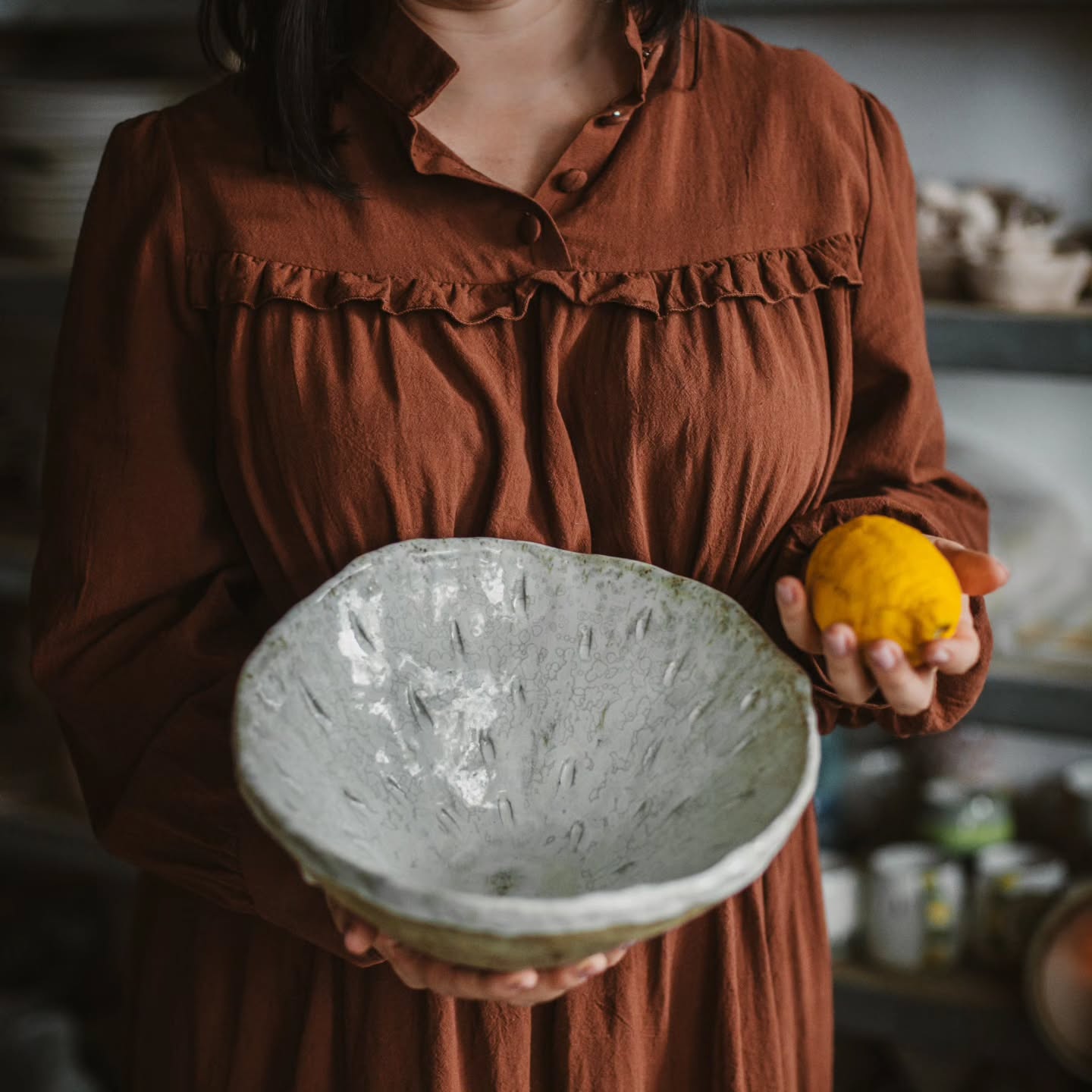 Some ceramic pieces are made less for one purpose and more for presence.
A bowl like this can hold fruit, bread, flowers, or simply remain empty and still feel complete in a space.
What I often enjoy most while making larger forms is that they carry a different kind of weight — not only physically, but visually too. They immediately become part of a table, a shelf, a room.
The glaze here moves freely, settling differently every time, leaving soft traces that can never be repeated in exactly the same way.
Perhaps that is what I love most in handmade work: even simplicity always keeps something unpredictable.
Would you use a bowl like this every day, or keep it as a piece that simply lives in the room?
handmade ceramic bowl | artisan serving bowl | large handmade pottery | ceramic centerpiece | handmade home object | artisan ceramics germany | textured ceramic bowl | slow living ceramics | handmade table object | studio pottery