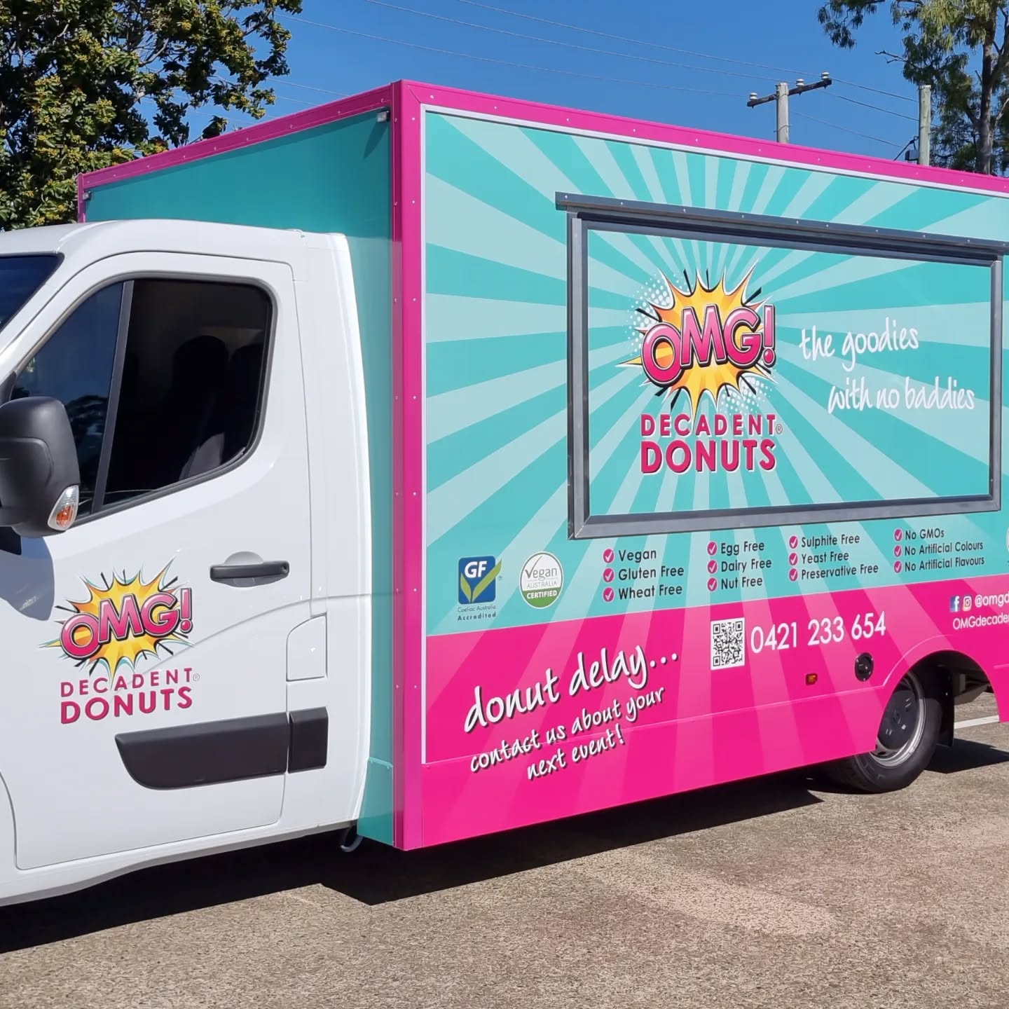 Omg Decadent Donuts Van, designed, printed and installed at HC Signs, professional installation, using premium USA made long lasting substance vinyl .