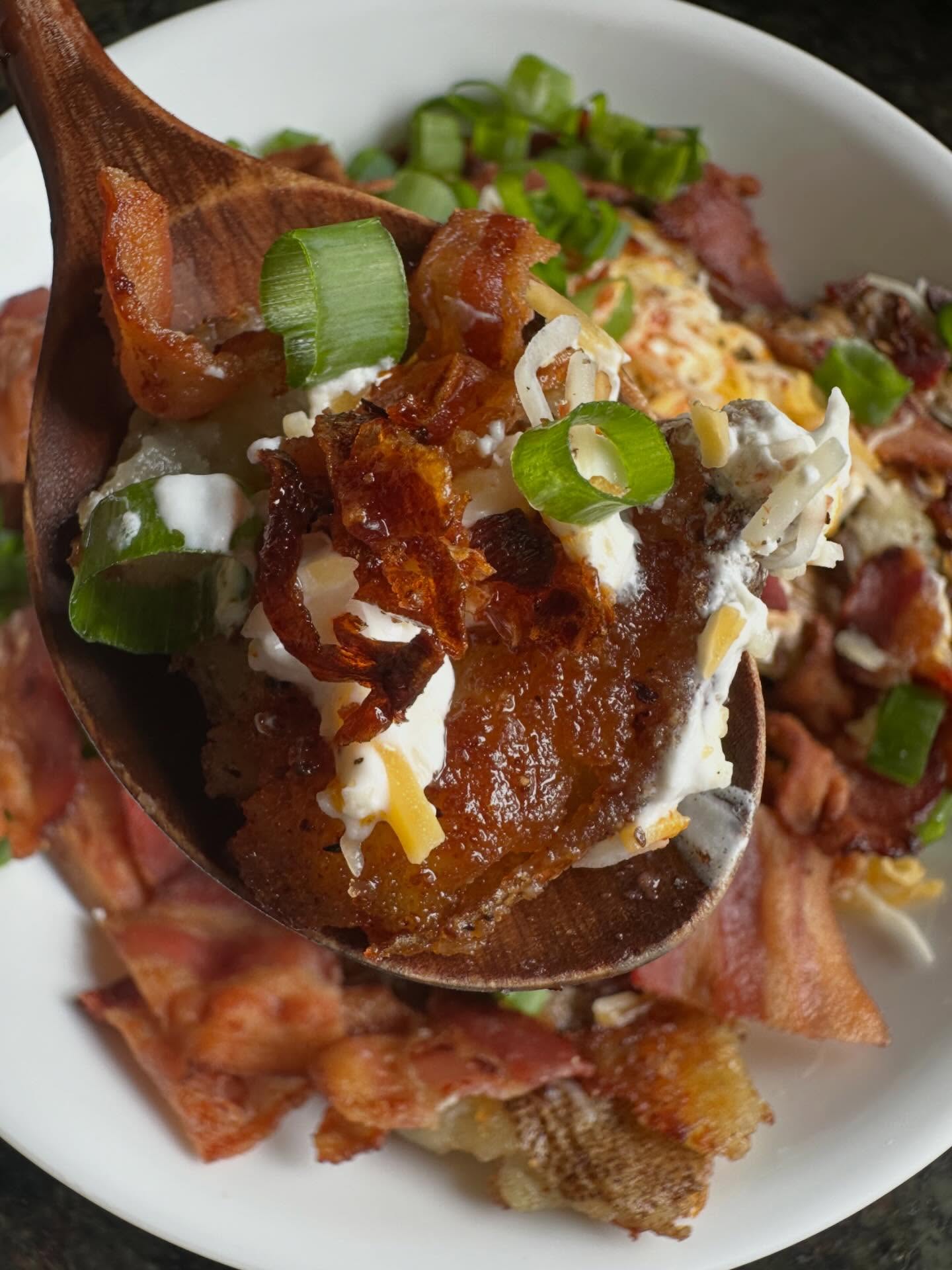 Loaded crispy smashed potatoes seasoned w/ #GaransballbaransSalt , topped with #GBcrunchyCHILIoil 🤤
