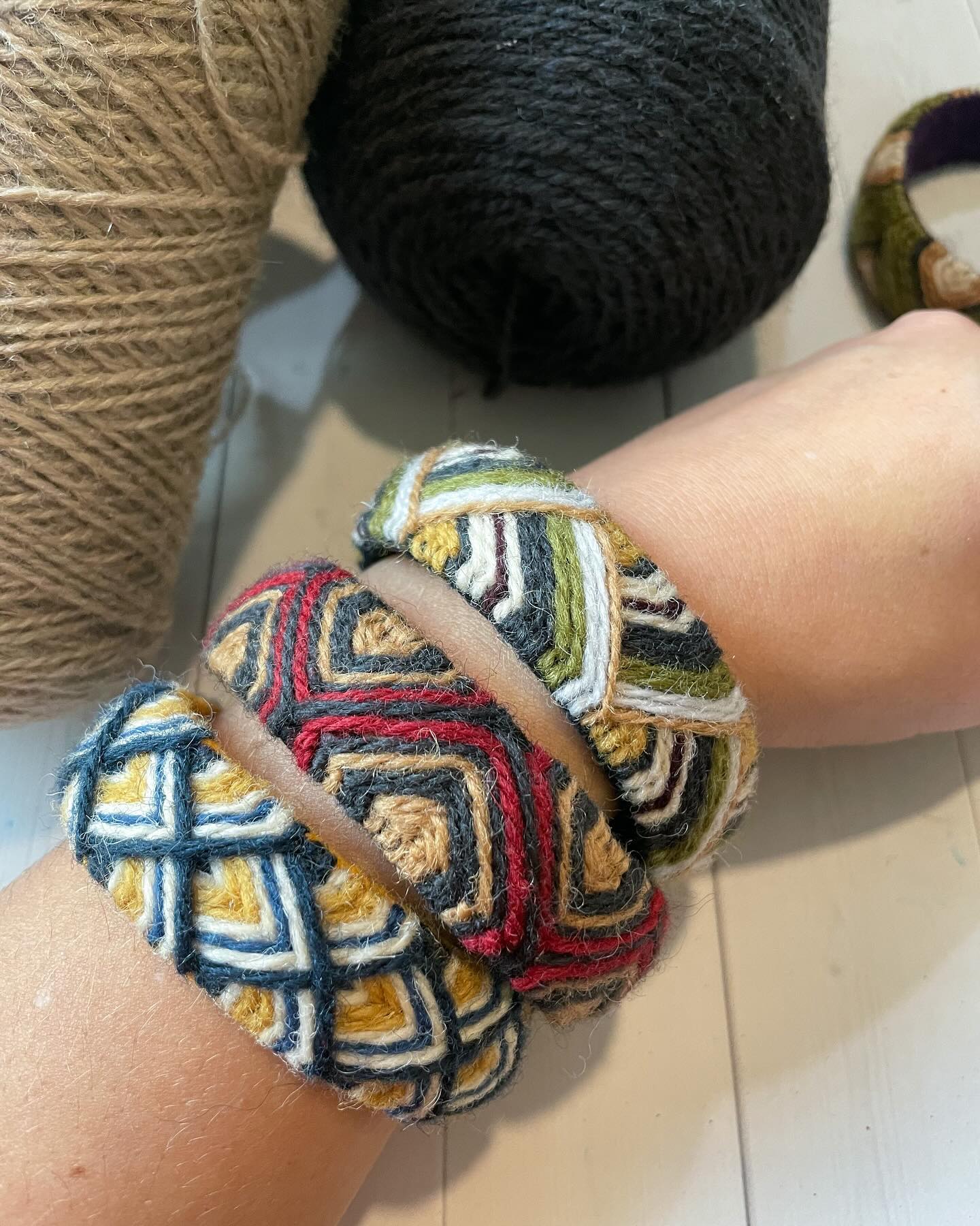 Recently I’ve been playing with the Japanese craft of Yubinuki. Traditionally used by seamstresses to make beautiful thimbles out of scraps. I’ve always found the technique interesting, but only recently decided I wanted to explore it for another project. I wanted to experiment with patterns and increasing the size of the patterns, so I started making these wool bangles. Now I’m completely addicted to making them! #yubinuki #fiberart #fiberjewelry #japanesethimble #wool #woolcraft #embroidery #woolembroidery #creativestitching