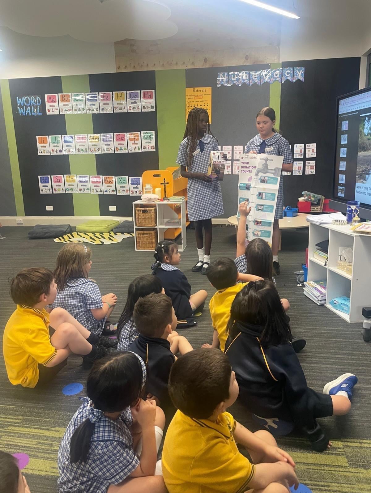 Earlier this month Esther and Emmy, two of our Social Justice Leaders, went and spoke to Prep about Project Compassion and how we can all almsgive this Lent.
The Preps were moved by Sisilia’s story - a young girl who lives with her family in Tanzania in a small home with one bed and no toilet. The Preps were pleased to hear that our 2025 Project Compassion contributions went towards helping build water taps in villages and schools, just like Sisilia’s!
Thank you to our student leaders for sharing with our Prep friends on how we can be ‘just like Jesus’ this Lent.