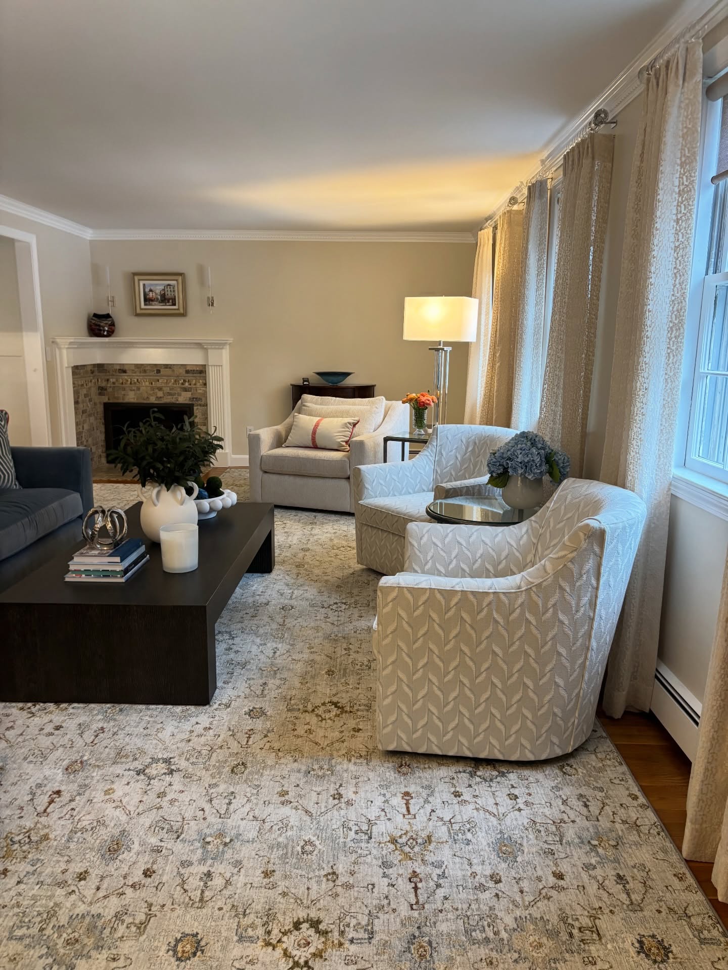 When I first started talking with my clients about their vision for their living room, they wanted to add a piano, and keep the 2 separate seating areas. The typical long living rooms we find in many older New England homes makes homeowners feel they need to furnish both sides of the room making for awkward layouts.
Here we nixed the piano and fireplace seating and created 1 large seating area that feels perfect for hosting friends for cocktails and enjoying a morning cup of coffee.
Swipe ➡️ to see the before 📸
#livingroomstyle #livingroomfurniture #interiorhome #homedesigner #timelessinteriors