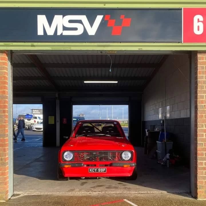 A couple of lovely pictures of the red Mk2 Escort of Andy Wishart all cozy in a Snetterton pit garage ready for a run. Currently running a 2L Vauxhall engine and a Sadev SCL82-17 sequential transmission, it is built for business!
The SCL82-17 pictured is fitted with the Caterham-type tail and lever but this gearbox can also be equipped with a Ford-type tail and lever or an output flange of either 3 or 4-bolt fixing. Robust and reliable, the 6-speed transmission has great presence in both circuit and rally scenes across the globe.
#sadev #Transmission #Gearbox #Competition #Racing #engine #ford #snetterton #sound #fordescort #vauxhall #Transmissions #sequential