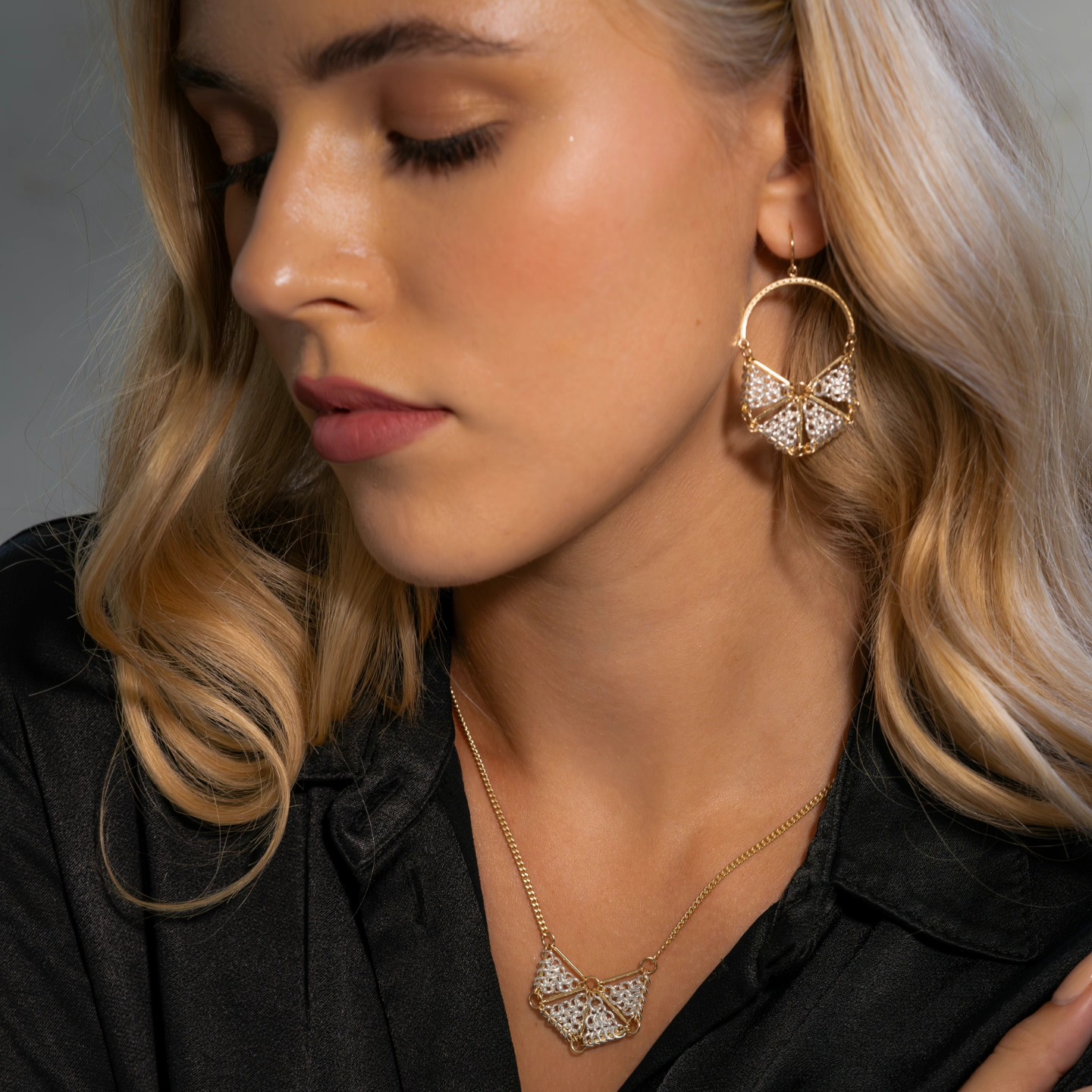 Meet LUNARA: Where Earth Meets Sky ✨
The LUNARA necklace captures celestial elegance, featuring a chain mesh that mirrors a half-moon’s curves. Paired with the LUNARA earrings, this duo weaves together earthly allure and cosmic wonder, adding spellbinding charm to every moment.
🌙 Embrace the lunar magic and let your style tell a story. #TrinityCollection #CelestialJewelry #CosmicElegance #JewelryWithMeaning #LuxuryJewels #FashionJewelry #JewelryAddict #ReelsFashion #ExplorePage