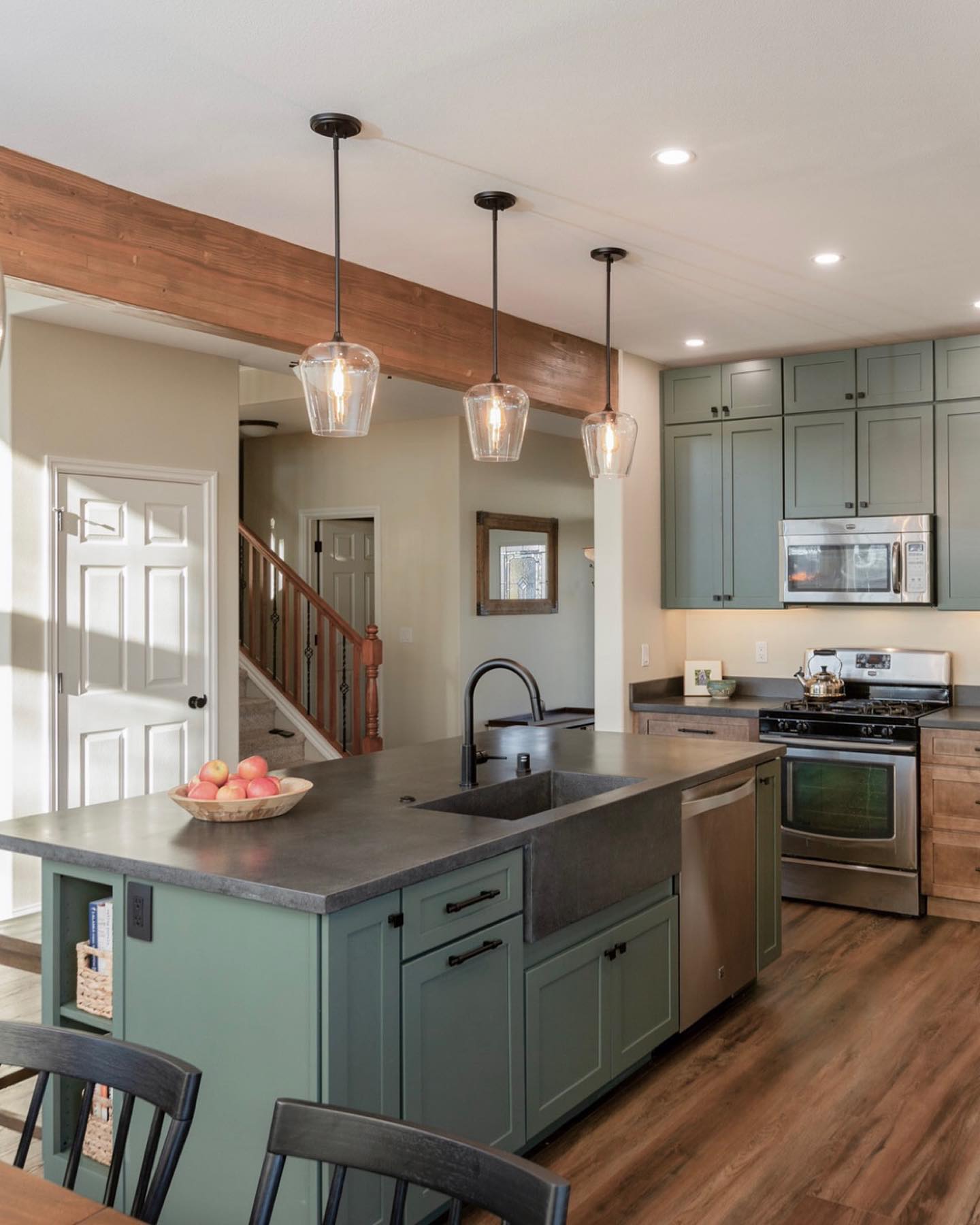 Our latest kitchen remodel reveal!
Thank you @lenaleephotography for the gorgeous photos!
This kitchen has down-to-earth style inspired by our client’s New Hampshire roots. Highlights include the two-toned cabinetry and the custom concrete countertops with integrated apron front sink by @cretewrxalaska!
Thank you to Timberwolf Construction for the beautiful installation!
.
.
.
.
.
#interiordesign #customdesign #interiordesigneagleriver #interiordesignanchorage #modernrustic #alaskainteriordesigner #alaskahome #interiordesigninspiration #alaskaremodel #kitchenremodel #concretecountertops #apronfrontsink #twotonecabinetry #aspendesign #newhampshireliving #alaskalifestyle