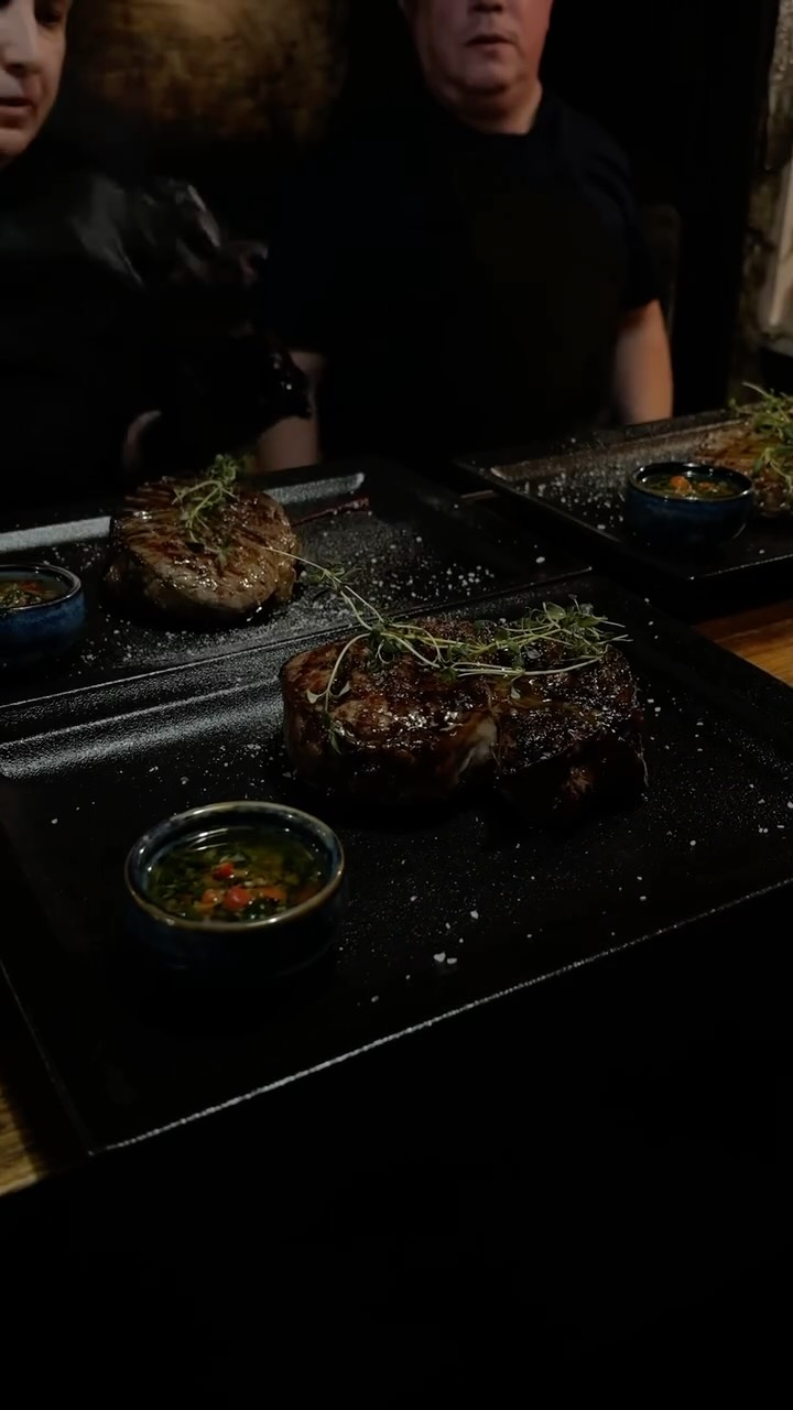Straight from the grill to your table!🔥 This is how our dishes are served. Every steak comes with our homemade chimichurri sauce. 😋
