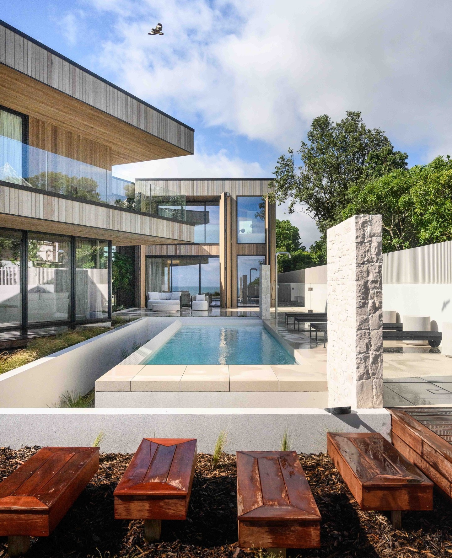 The poolside retreat reads as a natural continuation of this home.
With connections from multiple parts of the layout, movement between interior spaces and the outdoors feels effortless.
Whether stepping across the floating pathway, coming from a coffee in the central courtyard, or arriving directly from the pool house lounge and master suite, the architecture naturally draws the home around this outdoor setting.
A seamless rhythm between architecture and outdoor living 🌿
Architecture: @carnachan_architecture
#CalleyHomes #Papamoa #PoolsideLiving #OutdoorArchitecture #BeachfrontHome #LuxuryLiving #DesignAndBuild #NZArchitecture #ModernCoastal #SummerSpaces