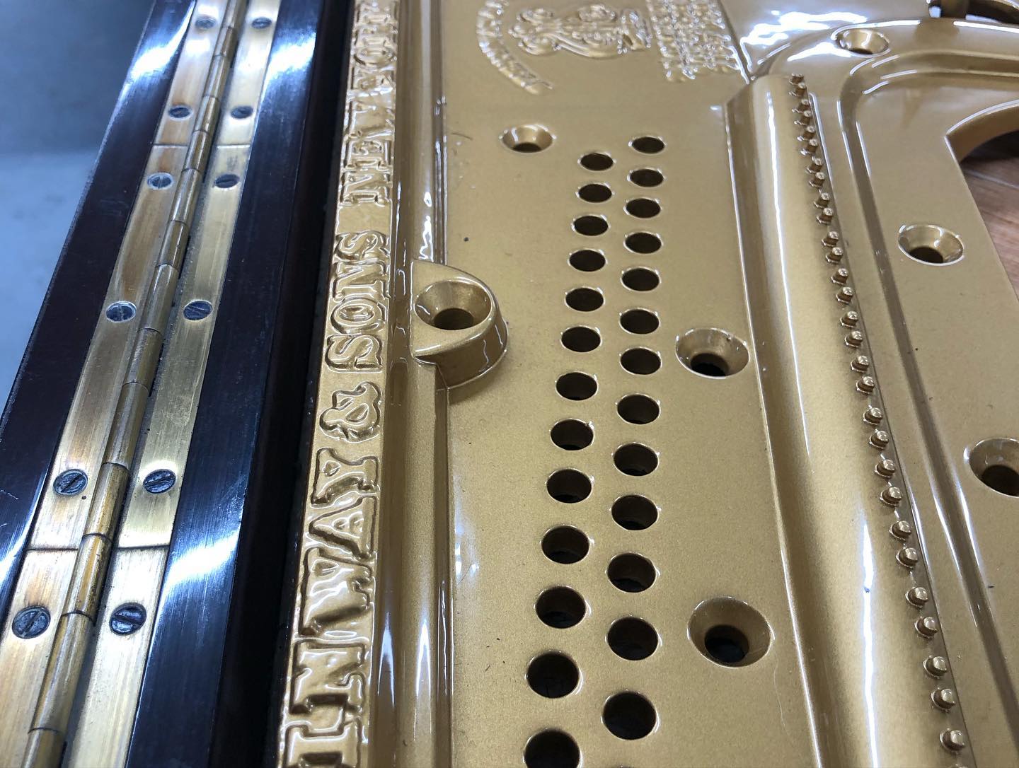 So happy to have on board quite possibly the best frame finisher ever! Can’t believe how smooth the finish is 😳
All done on site, using the hardiest, most anti-chip materials available. All frames that come through here are also initially shot blasted to save any risk of chemical reactions or imperfections coming through from previous finishes.
There have been some delays on this project but I’m happy to finally have the frame back in. Still got the lettering to do - best get the chief letterer in the team to do that though 😜(@laura_dayman_johns )
Sorry if the photos are a tad repetitive, I was quite excited 😂 sad I know… see the last photo for how it looked before :) big thank you to @itmesrah for helping with the painstaking process easing the frame back into the piano 🙌
#piano #pianorestoration #pianotuning #spraying #guilding #gold #furniturerestoration #antiquerestoration #workshop #metalfinishing