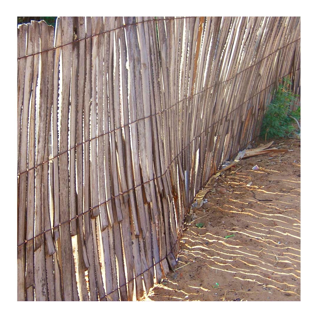 Palm Fences
.
Construction / Traditional Architecture
.
In rural areas, fences are mainly made from fallen leaves and branches of a tree. India's most commonly used fences are Palm, Coconut, Bamboo, and dried stems and branches. These fences are inexpensive and sustainable as they use things available in a region and are entirely made from discarded items.
Palmyra or Palm fences are one of the common types of fences found in South India. Every part of the palm is used in one way or another, and their discarded leaves and stems are used to weave a fence. These fences are merely a barrier to keep the animals away. They don't shut people outside like the huge concrete walls. These fences can be weaved very close or with gaps to allow air circulation based on the need.
Borders, Walls, Barriers, Boundaries, and Partitions are the things that define the world. They are the cause of numerous conflicts right now. But their origin was a simple fence, with the sole purpose of saving crops and settlements from wild animals. These early fences are simple, made from naturally available materials, and are still in use, serving their original purpose in rural areas.
Photography @jeevanlxavier
.
.
EDA is a crowdsourced archive of Everyday design from the Indian Subcontinent.
Follow @everydaydesignarchive for more.
.
.
.
.
.
.
.
.
.
.
.
.
.
.
.
.
.
.
.
.
.
.
.
#design #everyday #dailyobjects #designerobjects #homemade #artisanal #craftsofindia #artistsofindia #designarchive #indiansubcontinent #india #productdesign #householdobject #everydaydesignobjects #construction #sustainablefencing #fencing #sustainableliving #palmfences #coconutfence #ruralfencing