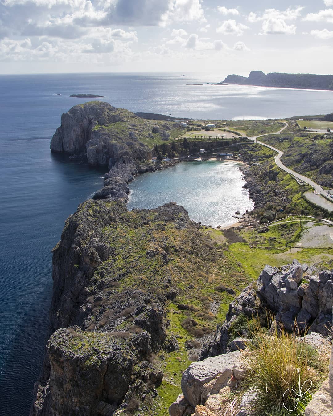 🏺🏛❗ Couldn’t resist with the occasion of Valentine’s Day 💙 not posting the natural heart-shaped closed Bay of St. Paul as viewed 125m above sea level at the edge of the Temple of Athena Lindia! Today many couples flock to get married during the summer at the little chapel of St. Paul at the edge of this charming bay (you can see its edge in the second photo to the right). Of course, this exclusive spot had not gone unnoticed by Hollywood that already marked this filming location as the epic WWII classic Guns of Navarone (1961) starring Anthony Quinn, David Niven and Gregory Peck has multiple scenes directly shot on the Lindian Acropolis.
◾◾◾
For now, this is my last photograph from Lindos, Rhodes and I still can’t decide what was more impressive the incredible history and the temples or the breathtaking view - quite a rare treat in winter indeed! Nonetheless, I do dream of a time when Greece will become a 12month travel destination as having visited this site both in winter and in 40deg Celsius summer my vote goes 100% for a winter visit!
◾◾◾
❗Date of Visit: Jan 29, 2020
Weather Conditions: I would like to say even though it was relatively warm the weather was very indecisive interchanging between 5minute mini rain showers and bold sunlight. Also, at the top of the archaeological site it was extremely windy so if you do visit in winter careful at the edge especially if you are taking photographs (my hands where shaking) as there is a steep cliff!
◾◾◾
#wanderlust #picoftheday #photooftheday #architecture #arch #greektemples #ig_greece #athens #travelblog #travelgram #letsgo #goexplore #travelphotography #discovergreece #greekbloggers #greecelover_gr #greece_all #greece_is_awesome #feelgreece #greece_united #greecelovers #view #adoregreece #sea #greecetravelgr #greece_moments #village #reasontovisitgreece #lindos #rhodes