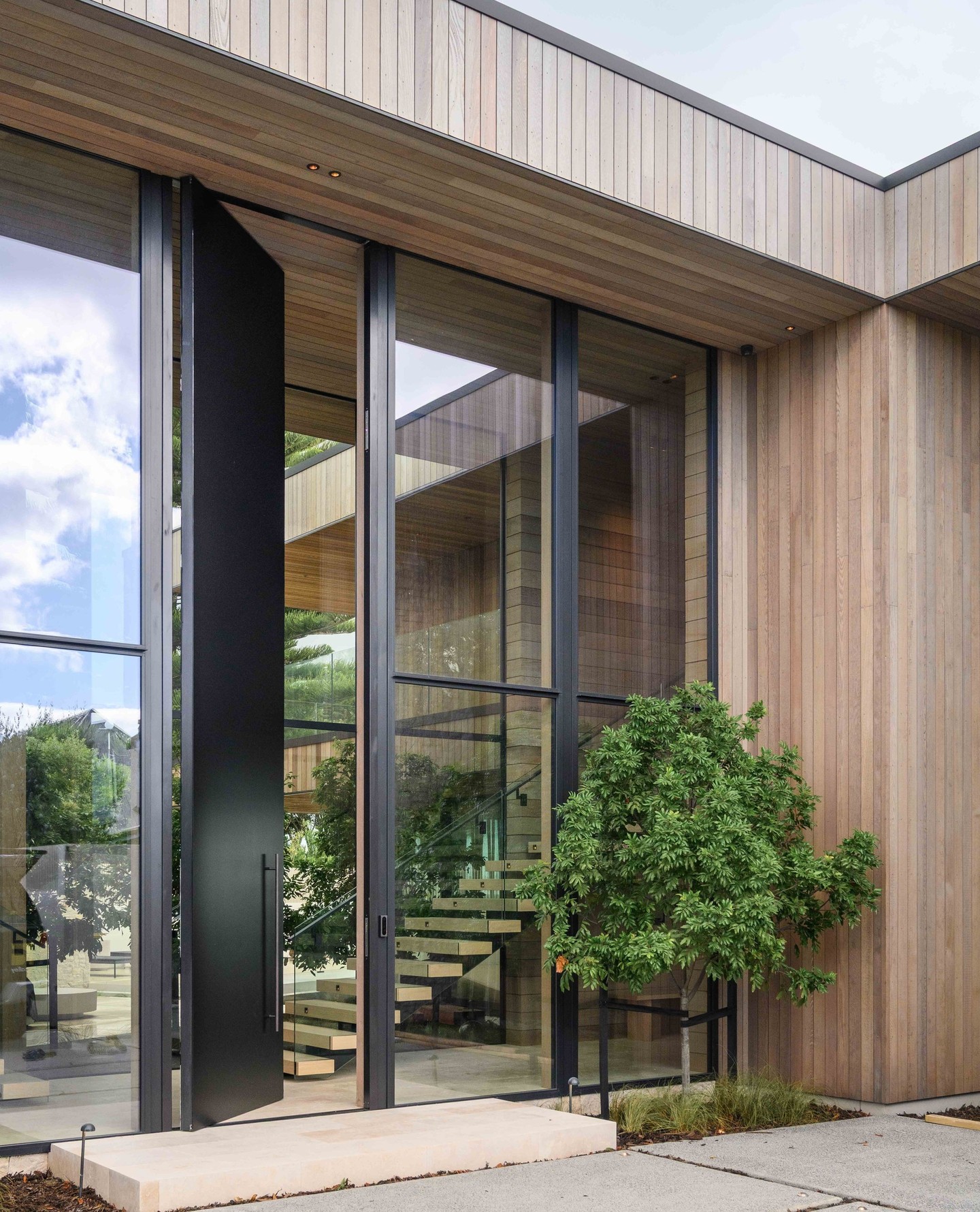 A first impression designed to match the scale of this Papamoa beachfront retreat.
This striking two-storey entry door establishes the vertical rhythm of the façade, drawing the eye upward and reinforcing the home’s architectural presence. The oversized proportions required careful structural coordination to maintain clean lines while ensuring the door integrates seamlessly within the surrounding joinery and cladding.
A confident arrival that sets the tone for the spaces beyond ✨
More to come from this special project soon.
Architecture: @carnachan_architecture
#CalleyHomes #Papamoa #ArchitecturalEntry #BeachfrontHome #DesignAndBuild #NZArchitecture #LuxuryHome #ArchitecturalDetail #NZBuilder #ModernArchitecture