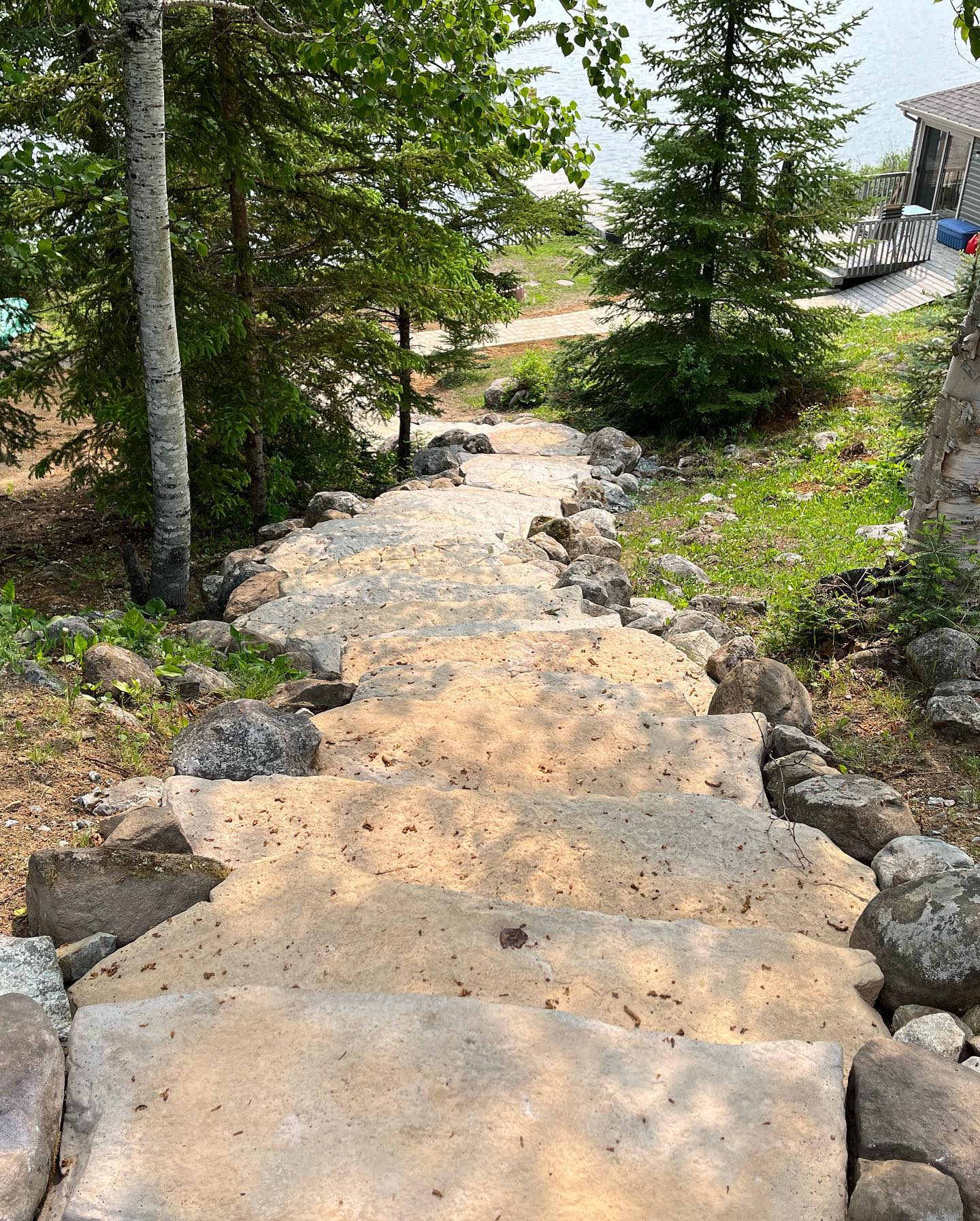 Rosetta irregular steps blending in well with the rugged landscape #northernontario#rockandtreeslandscape#lakelife#stepstothelake @barkmanconcrete @lockstoneyardandpatio