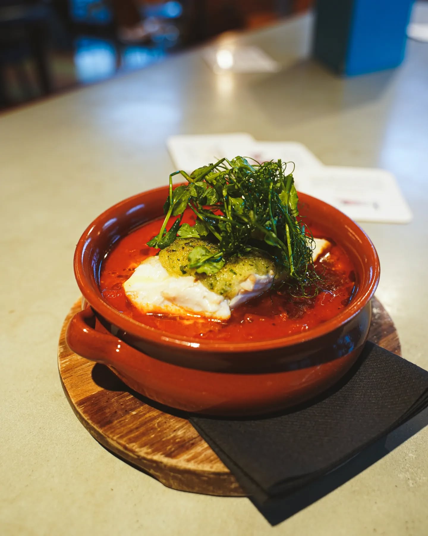 The Herb Crusted Fish Fillet. Served with beans and chorizo, served in a small casserole. A @binksyard special ✨️
