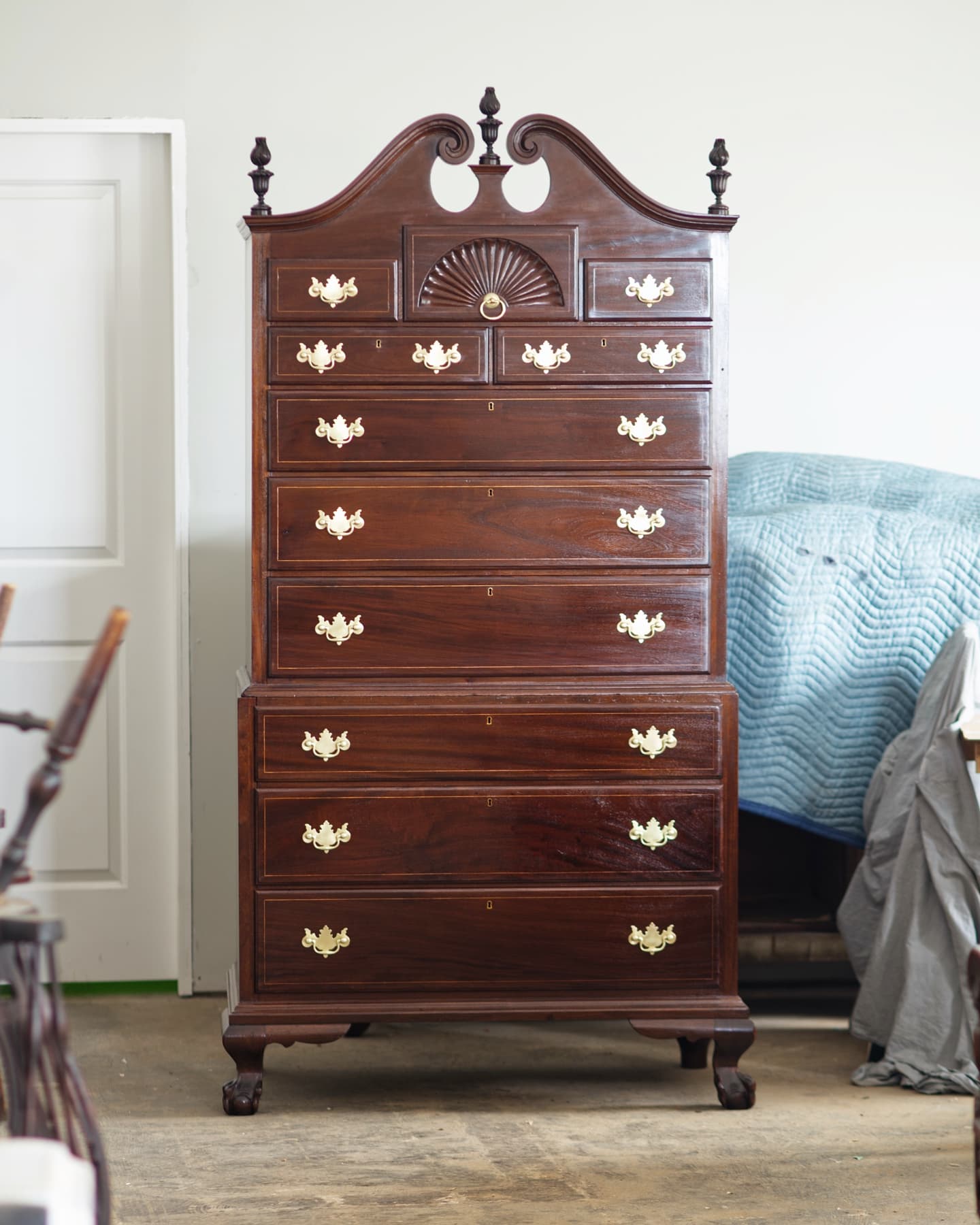 It's been a while since I polished one of these big boys; I'd forgotten how long it takes!
But such an improvement over the crazed finish that made it difficult to see the wood beneath it. Much clearer now and the cleaned up brass hardware also brightens the whole thing.
#furniturerestoration #furniturerestorer #mahogany #chestonchest #highboy #cowan #shellac #shellacfinish #frenchpolish #frenchpolisher #restoredinbaltimore