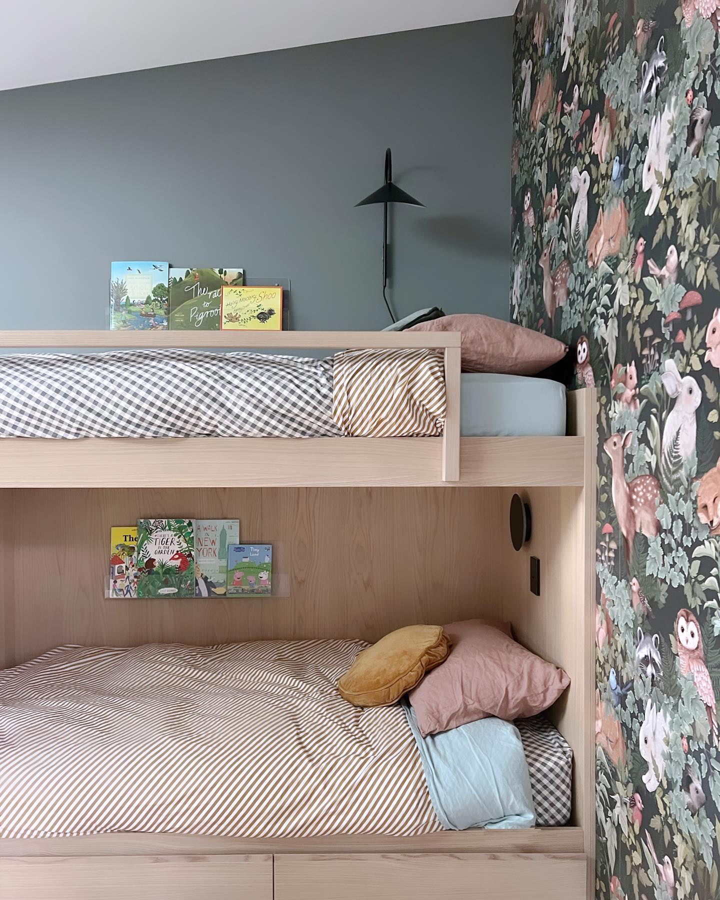 Bunk-room Design 🌳🌲 🦌 🦉
The perfect opportunity to use colour and be a little bit playful with the interiors. We paired this gorgeous woodlands wallpaper with custom designed bunkbeds. Storage was incorporated underneath & each bunk has its own set of fun linen, a wall light and bookshelf for evening stories #ttdproject