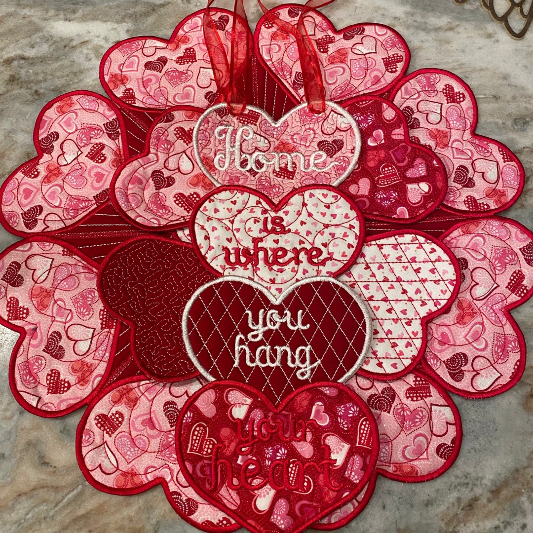 Straight from the sewing machine today!
Really pleased with how these turned out!
Order finished just in time for Valentine's Day! Table centerpiece, coaster, and decorative hanger.