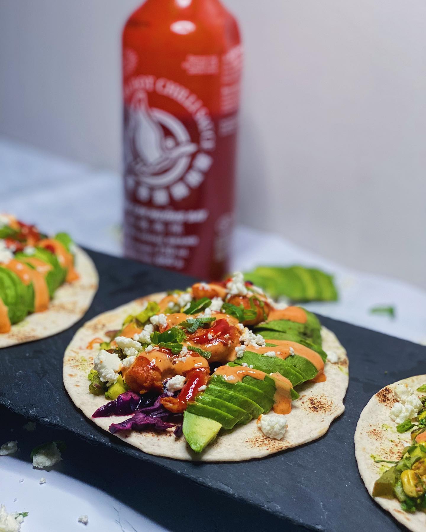 Spicy Prawn Tacos 🌮💃🍤🇲🇽
————————————
Taco Tuesday was a blast, I made spicy prawn tacos filled with a mango and fresh sweetcorn salsa, pickled cabbage, avocado and dressed with some siracha mayo and feta cheese.
Recipe for 6 tacos.
————————————
1. Begin by marinating 18 king prawns in 2tbsp olive oil, 1 tbsp smoked paprika, 1/4 tspn cayenne pepper, 1/2 tspn salt, 1/2 tspn black pepper and 1 tspn harrisa paste.
2. Next, pickle a cup of shredded red cabbage in 1 tbsp olive oil, 1/2 lime juiced, 1/2 tspn cumin and 1/2 tspn paprika.
3. Now slice the avacado into even sized pieces and set aside.
4. Onto the salsa, in a large mixing bowl add one finely diced red onion, 1 finely diced mango, 1/2 cup finely diced jalapeños.
5. Next, cook 1 large corn cob in the oven for 20 minutes until slightly charred. Then blowtorch the outside a little bit (if you don’t have a blowtorch, grill the corn). Finally, cut the corn off the cob and add it to the salsa mix.
6. Now, in a blended mix 1 cup coriander, 2 tbsp olive oil, 1 garlic clove and 1 lime juiced. Add the coriander sauce to the salsa and mix it up. Lastly add some more freshly chopped coriander to the mix.
7. Now, cook the prawns on a medium heat for 2 minutes whilst turning regularly.
8. Lastly, assemble the tacos with a flour tortilla at the bottom and then pile on top some cabbage, avocado, salsa and prawns. Finally garnish with some crumbled feta and siracha mayo (mix up mayo and siracha sauce)
————————————
#tacotuesday #mexicanfood #tacos #prawns #avacado #siracha #cabbage #healthy #fresh #corn #salsa #foodporn #instadaily #fyp #eat #cooking #recipes