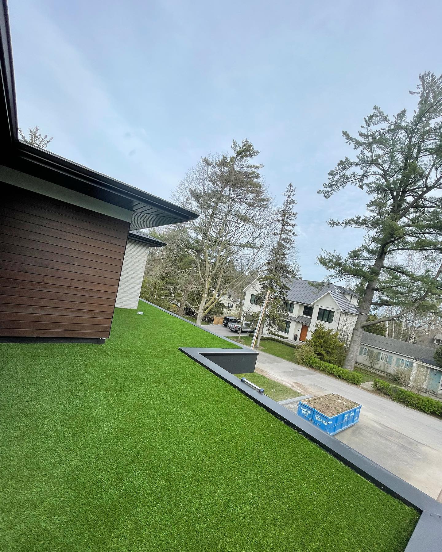 What do you see outside your window? From an ugly flat roof to a LUX green beauty 🌱✨ give your home the California Modern Mansion look. #nevermowagain