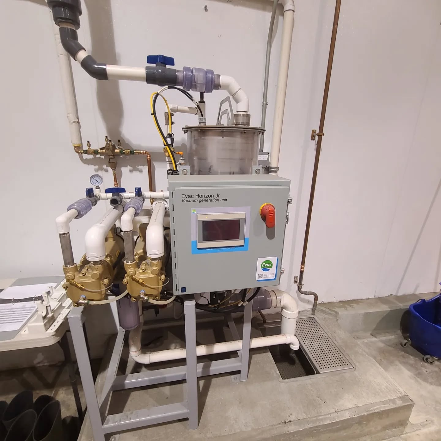 Paving the way for the future of drainage!
When underground drainage plumbing is condemned, or relocation of equipment is integral, EVAC systems utilize negative suction pressure to draw waste vertically up and over to gravity drainage.
24x24x16 stainless drain installed and tapped into the main waste line as well!