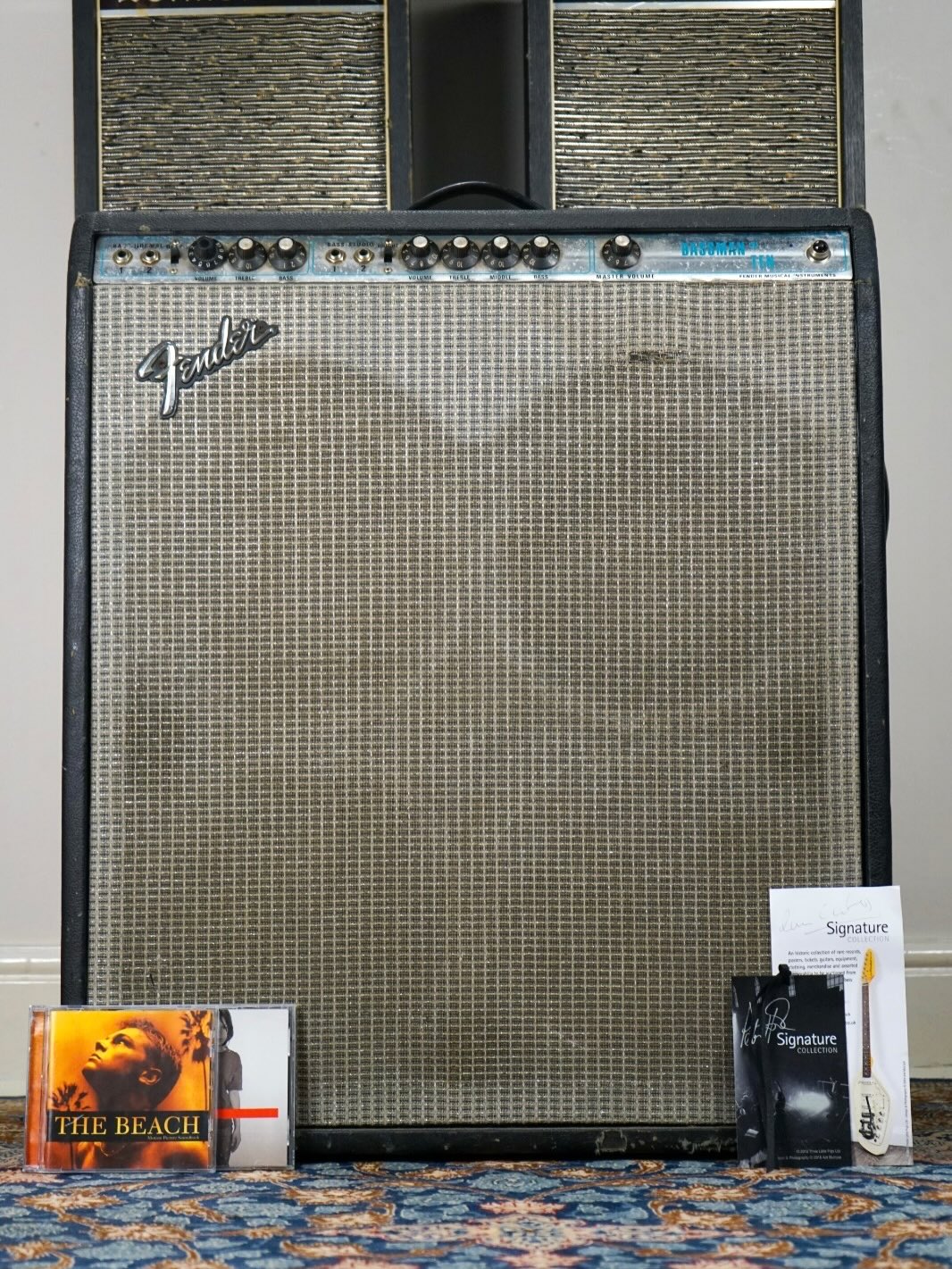 Peter Hook’s Bassman Ten.
Yes, you read that right - this beautiful 70s silverface was owned by Peter Hook and used on the soundtrack for the soundtrack of the 2000 film ‘The Beach’ (feat. Leonardo DiCaprio). It was also used on all the bass tracks for New Order’s ‘GET READY’.
Last sold at auction in 2019 for the ‘Peter Hook Collection’, it is fully-document as having being purchased by Peter from Sounds Great (Cheadle) in 2000 and comes with the CDs it was used on.
I have had it fully serviced (not much work was needed) and it’s a fantastic bass amp in its own right, boasting a colossal 4x 10’ speakers, 50w of power and importantly - a master volume (drive tones at a reasonable volume!).
A great amp with cast-iron provenance tying it to one of the most influential bass players of the 20th century.