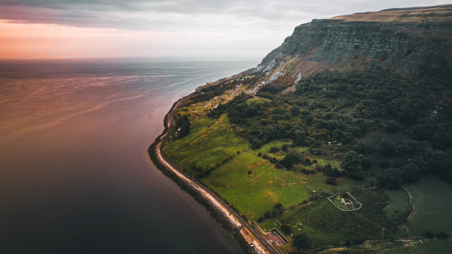 ✨ Not your average morning commute… ✨
While most of us were still hitting the snooze button, Virtual Towns was already in the air capturing the Antrim Coast Road & Glens in that rare, quiet moment before sunrise 🌅🚁
There’s something magical about seeing the first light crawl over Carnlough, turning the coastline into a painting. No filters. No edits. Just the raw beauty of one of Ireland’s most iconic drives, viewed from above.
📸 Swipe through these aerial shots and tell us—
👉 Are you an early bird who’s seen this in real life?
👉 Or a night owl who’s just discovering how unreal dawn looks over the Glens?
Either way, mornings like this remind us why the Antrim Coast is world-famous.
#VirtualTowns #AntrimCoast #DronePhotography #ireland