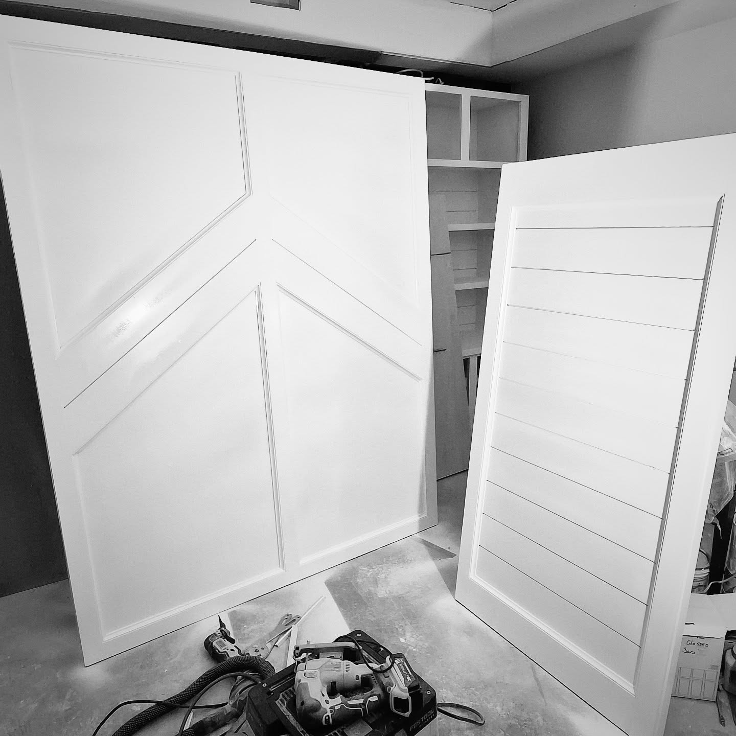 The custom murphy bed is finally painted along with the barn door for the bonus storage space under the stairs. Progress is fun.