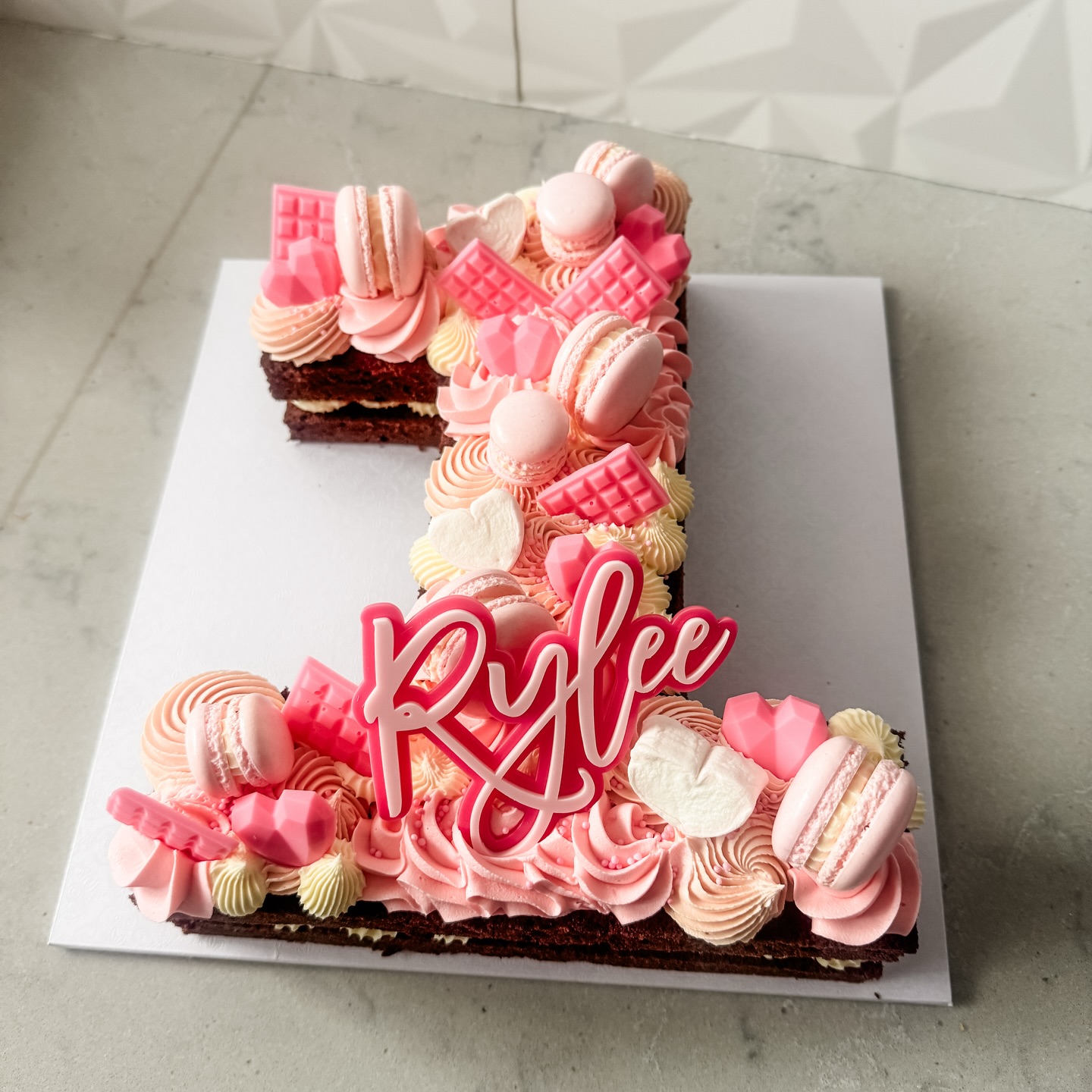 Pretty in Pink ๐ digit cakes are still a favourite
@designat409