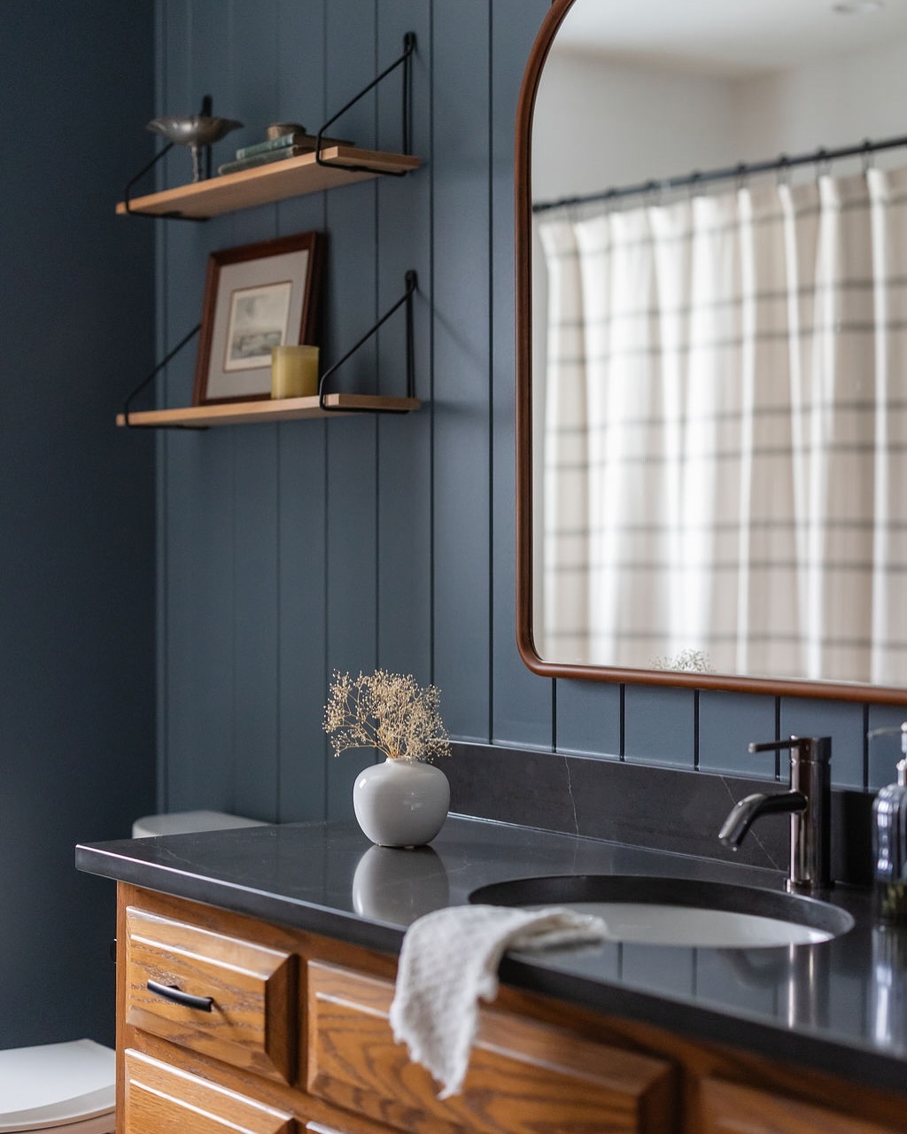 Even small spaces can have a big impact. I loved bringing life and personality to this bath that was once all builder grade finishes. From the checkered floor tile to the paneled vanity wall, this bathroom stands out as a real favorite.
design + styling | @cosmicdesignstudio.am
photo | @yandbinteriorsphotography
*
*
*
#bathroomdesign #bathroomrenovation #homerenovation #cosmicdesignstudio #interiordesign