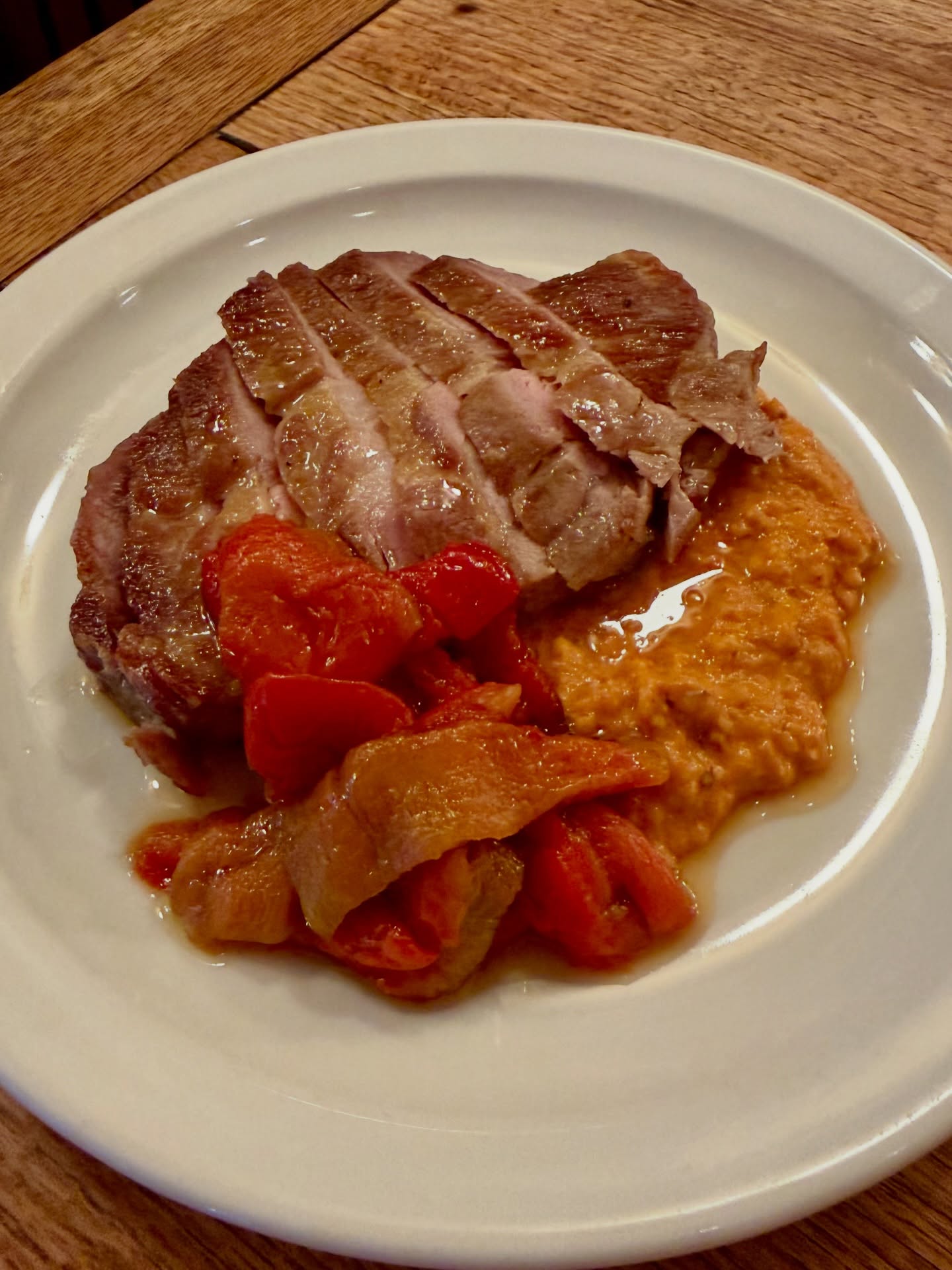 Pork ribeye w romesco & pickled peppers