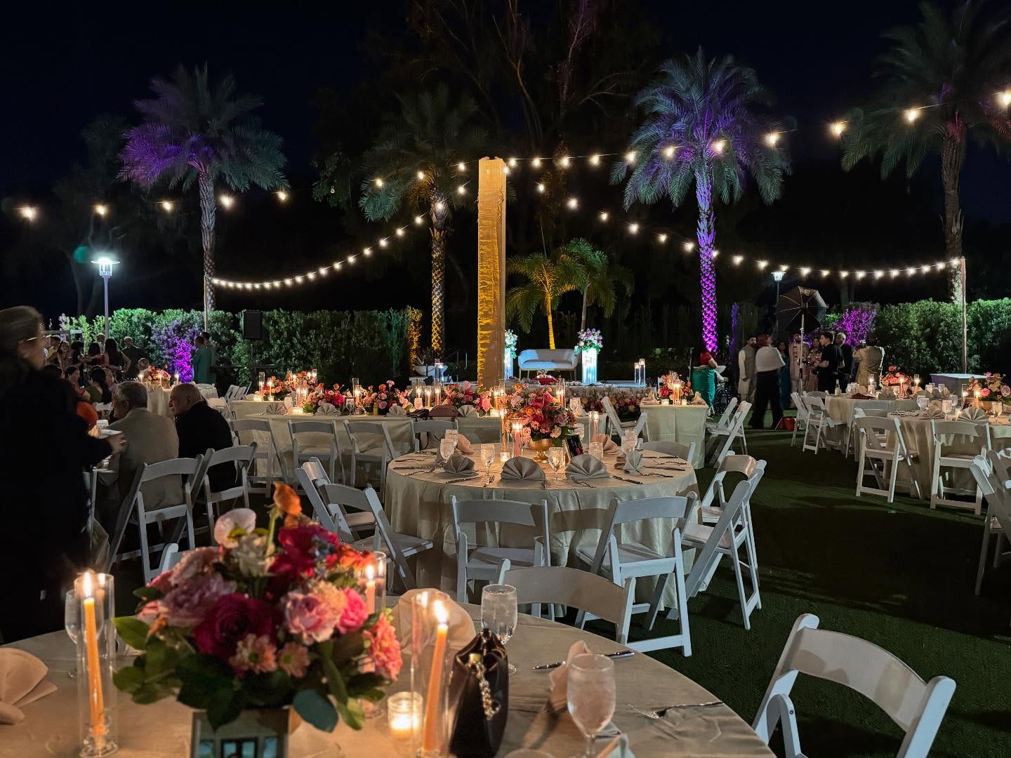 What a wonderful night for a beautiful wedding adorned with our string lighting .
.
.
.
.
#tylerlightdotcom #tylerlight #uplights #led #orlandoevent floridaevent colorful eventlighting orlandodmc corporateevent weddinguplights centralfloridaevent bestleduplighting chandelier wedding foodtruck stringlight marketlights halloweenlighting fairylighting weddingvenuemap